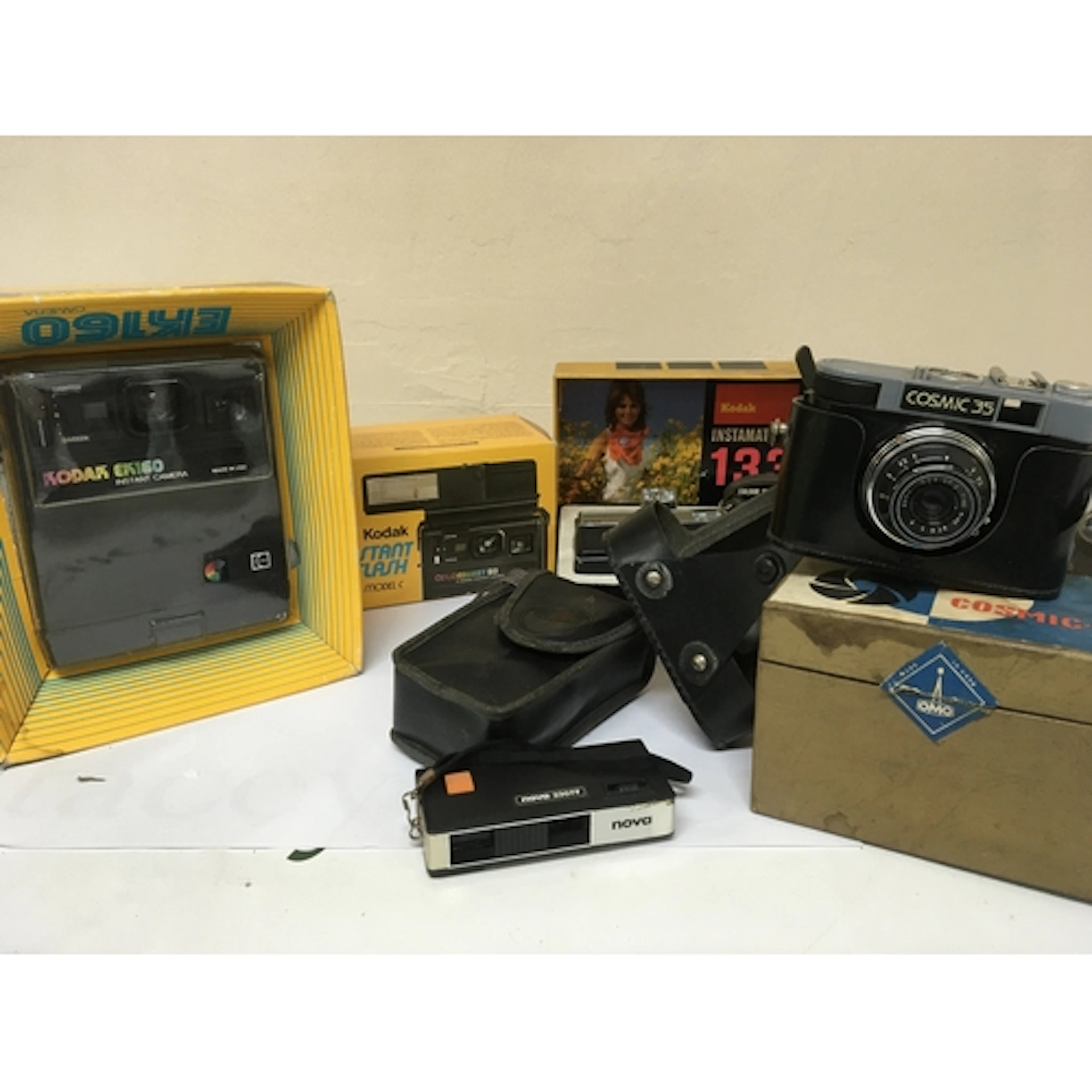 A collection of Vintage cameras boxed and as new Kodak Insta...
