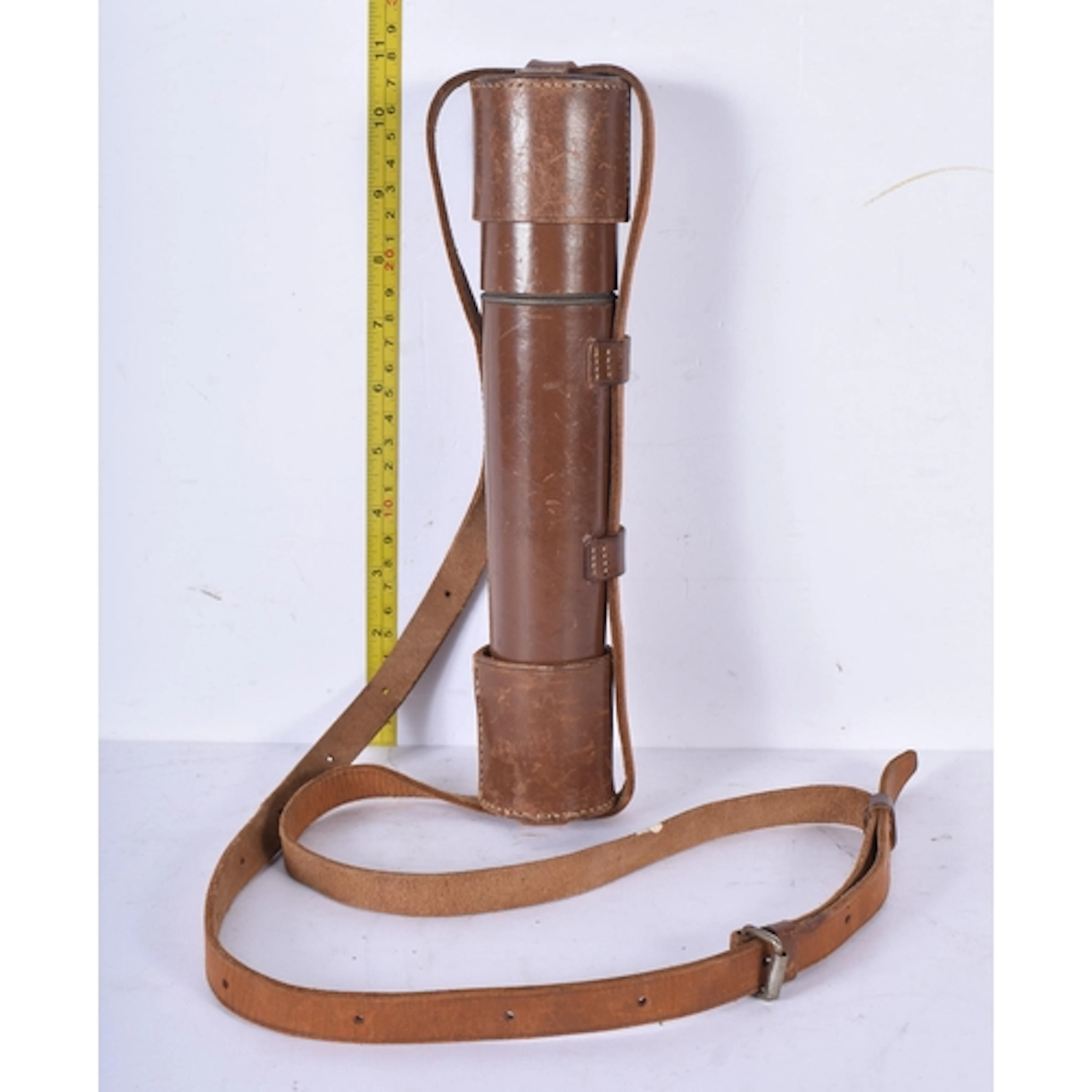A vintage leather cased Britannic to draw brass telescope by...