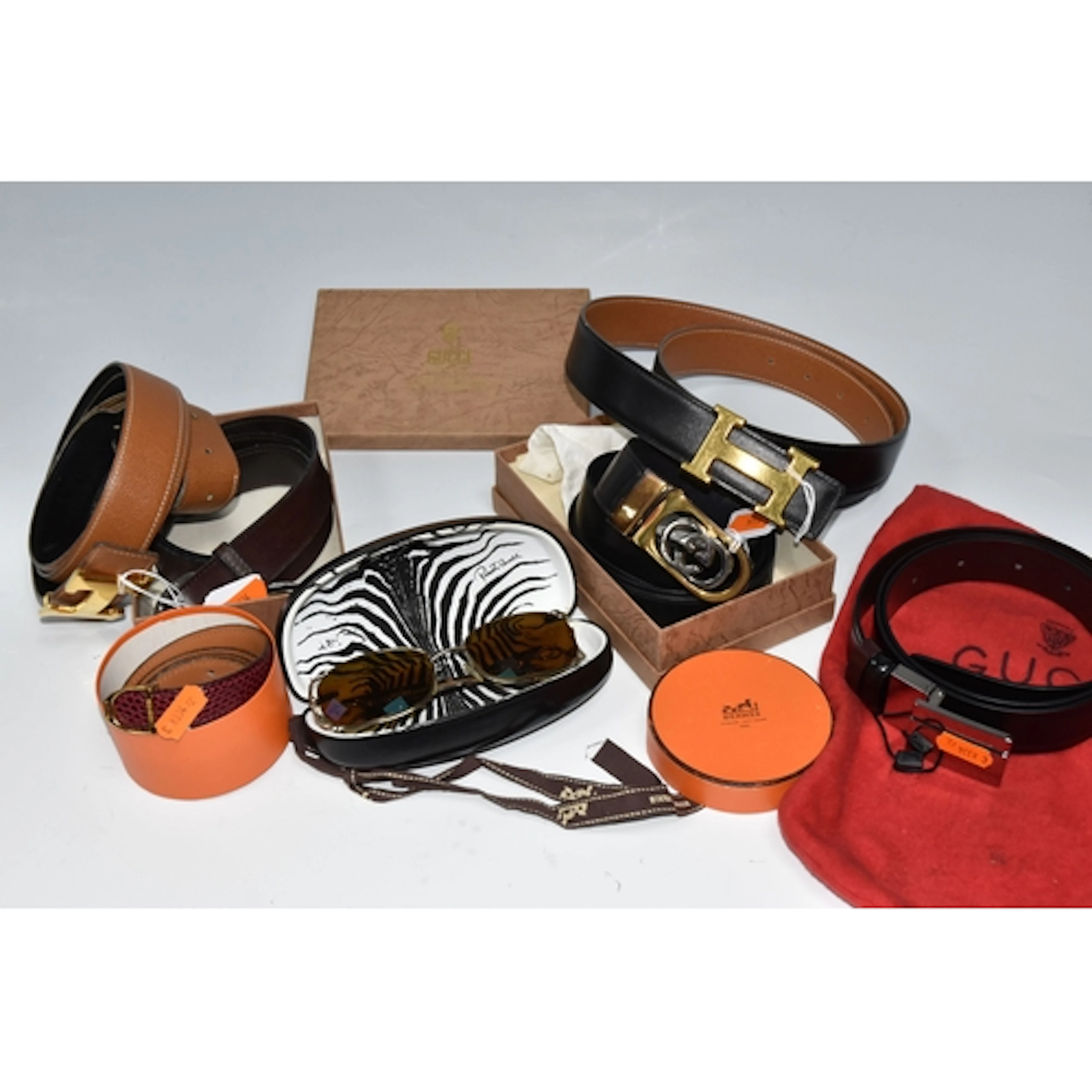 A GROUP OF DESIGNER ACCESSORIES, comprising a Hermes black l...