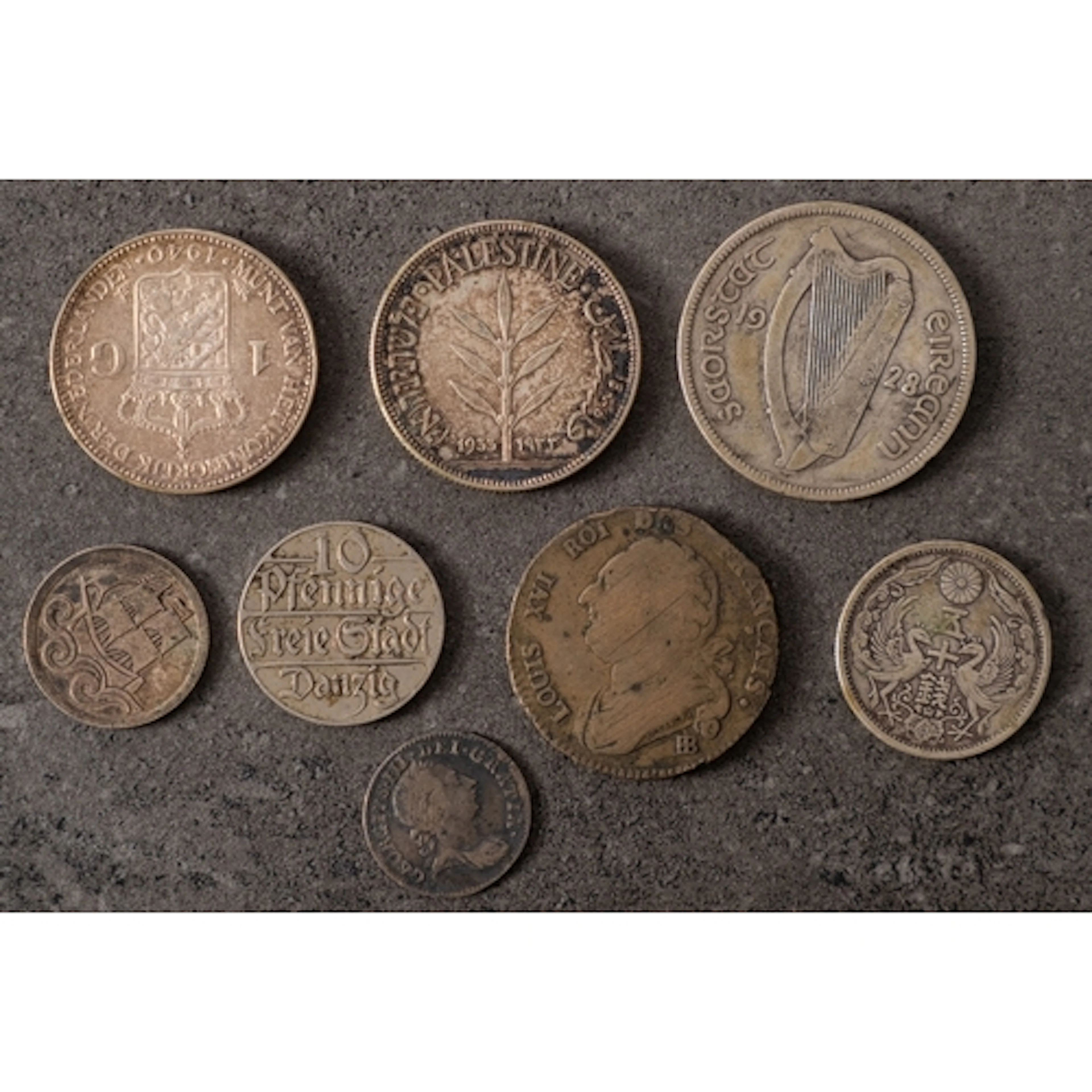 A 1933 Palestine 100 Mils coin. Together with a collection o...