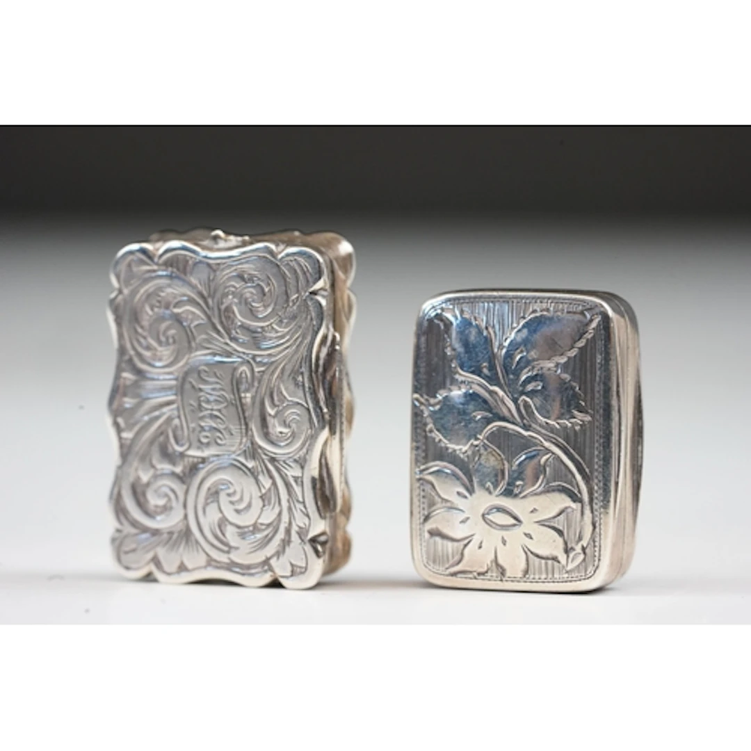 Victorian silver foliate engraved vinaigrette, the central c...