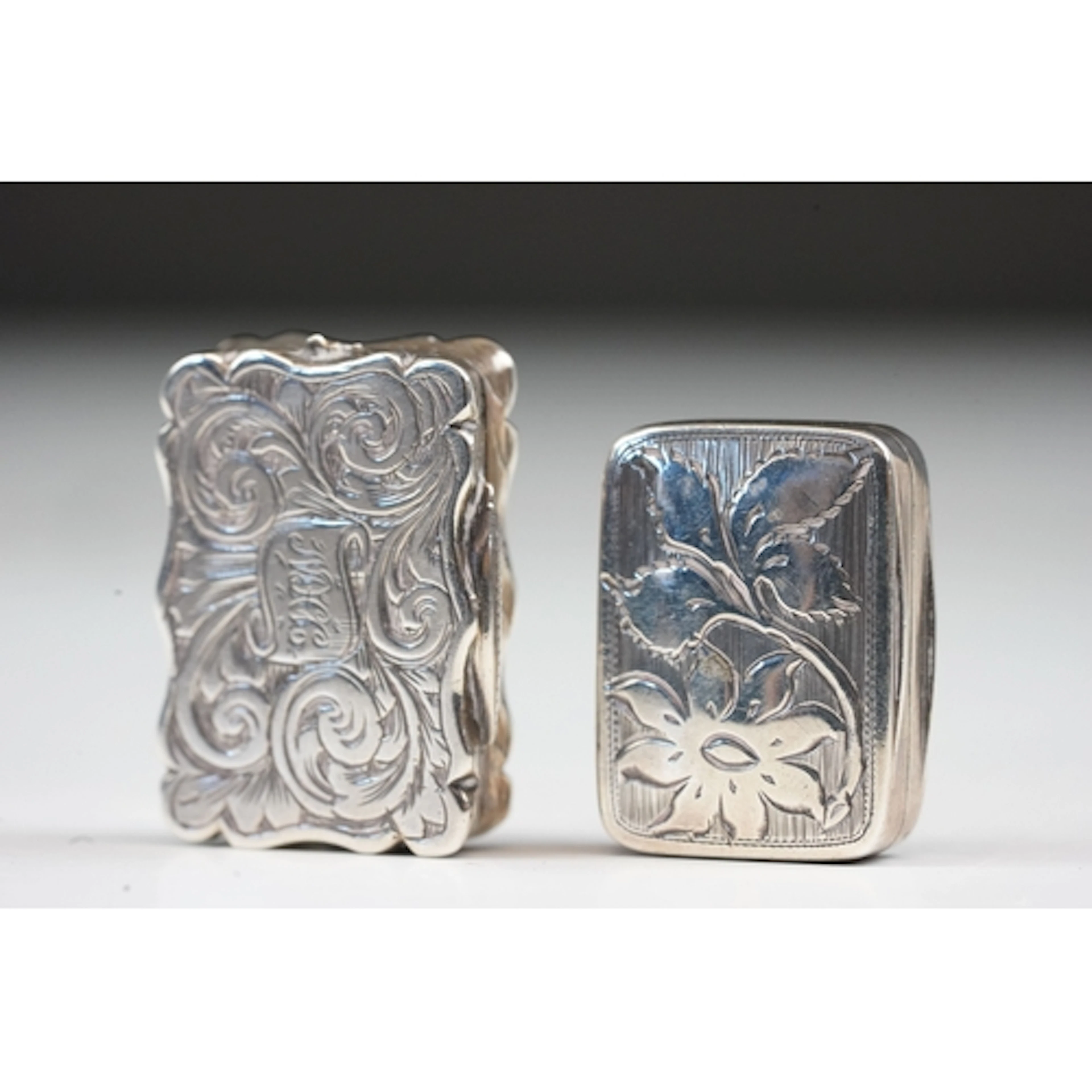 Victorian silver foliate engraved vinaigrette, the central c...