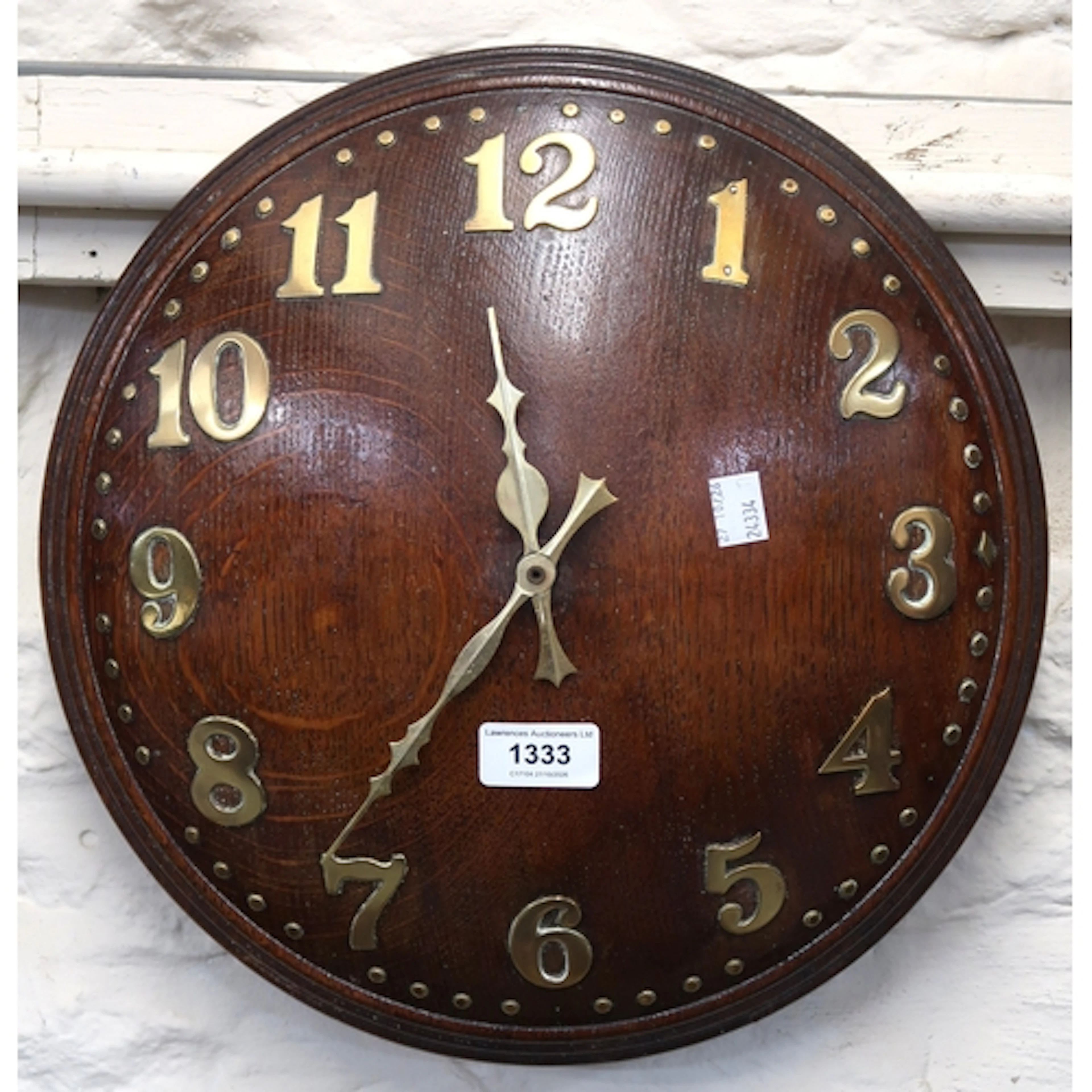 Retailed by Heals, Arts & Crafts circular oak wall clock, wi...