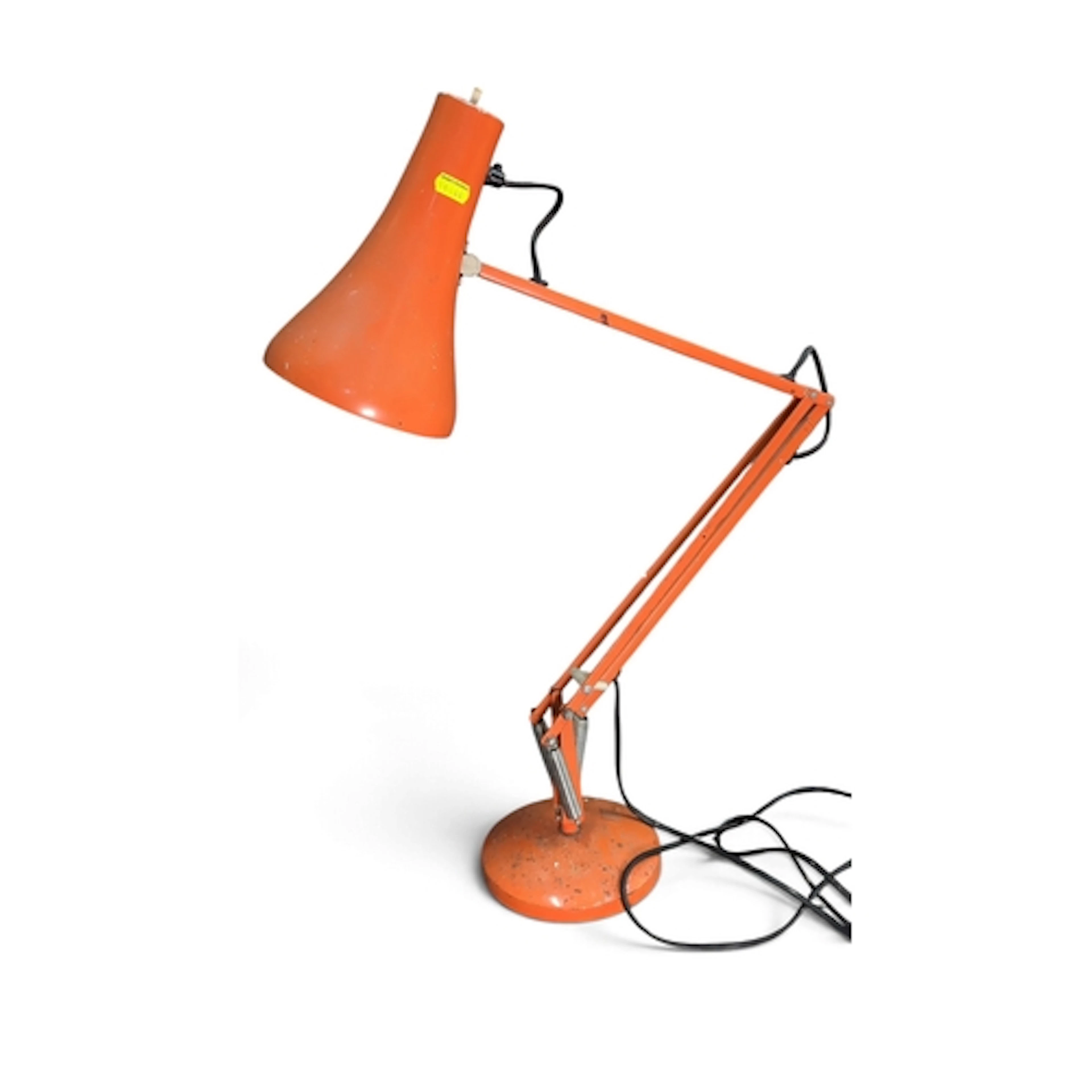 Orange-painted metal desk lamp with an articulated, spring-b...
