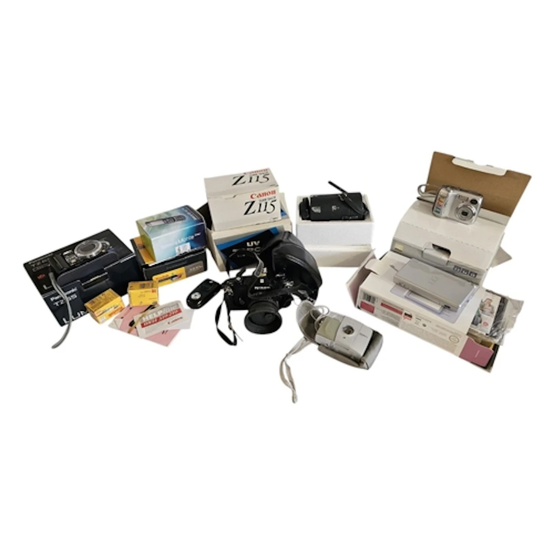 A COLLECTION OF VINTAGE FILM AND DIGITAL CAMERAS AND ACCESSO...