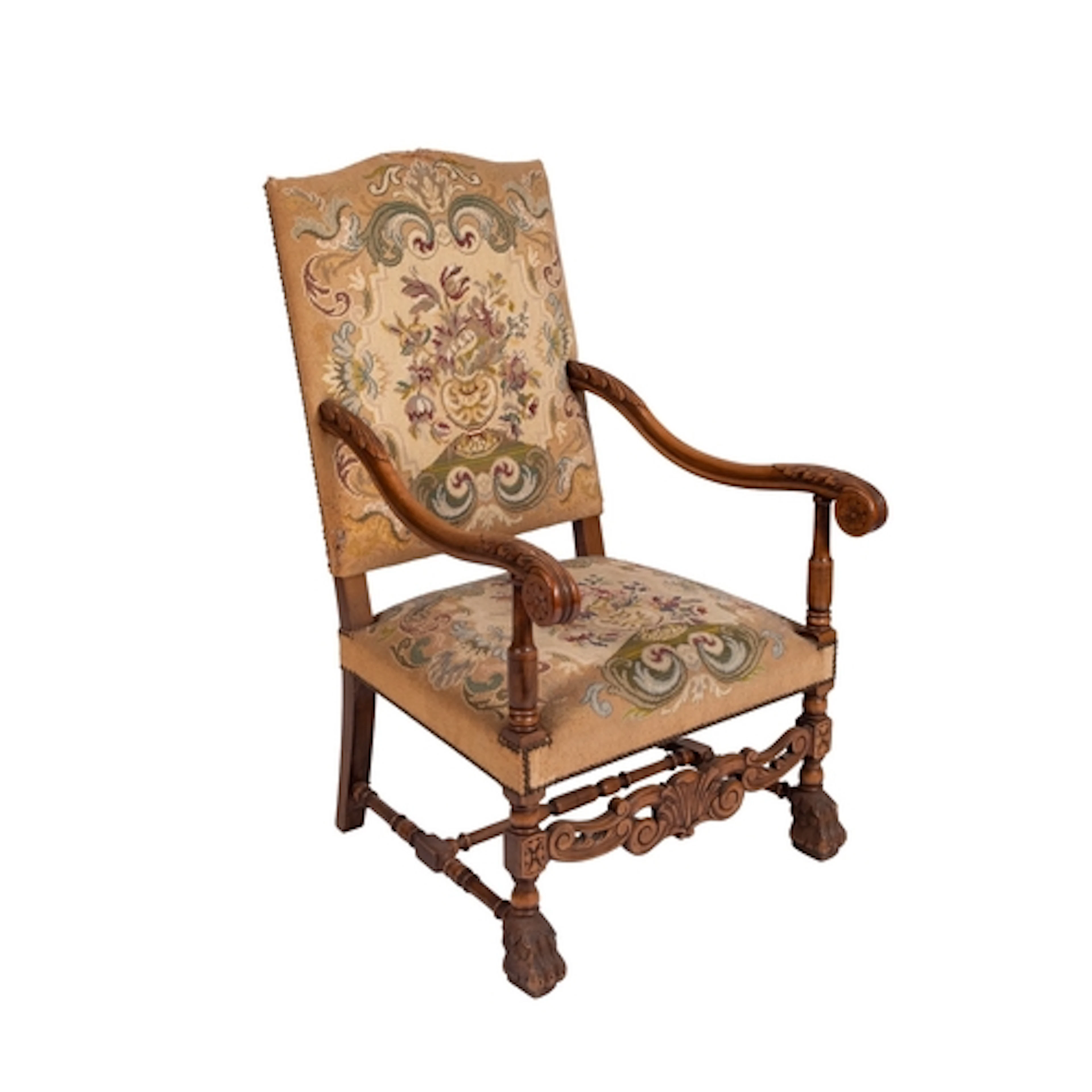 A carved beech wood open armchair in the Carolean taste, wit...