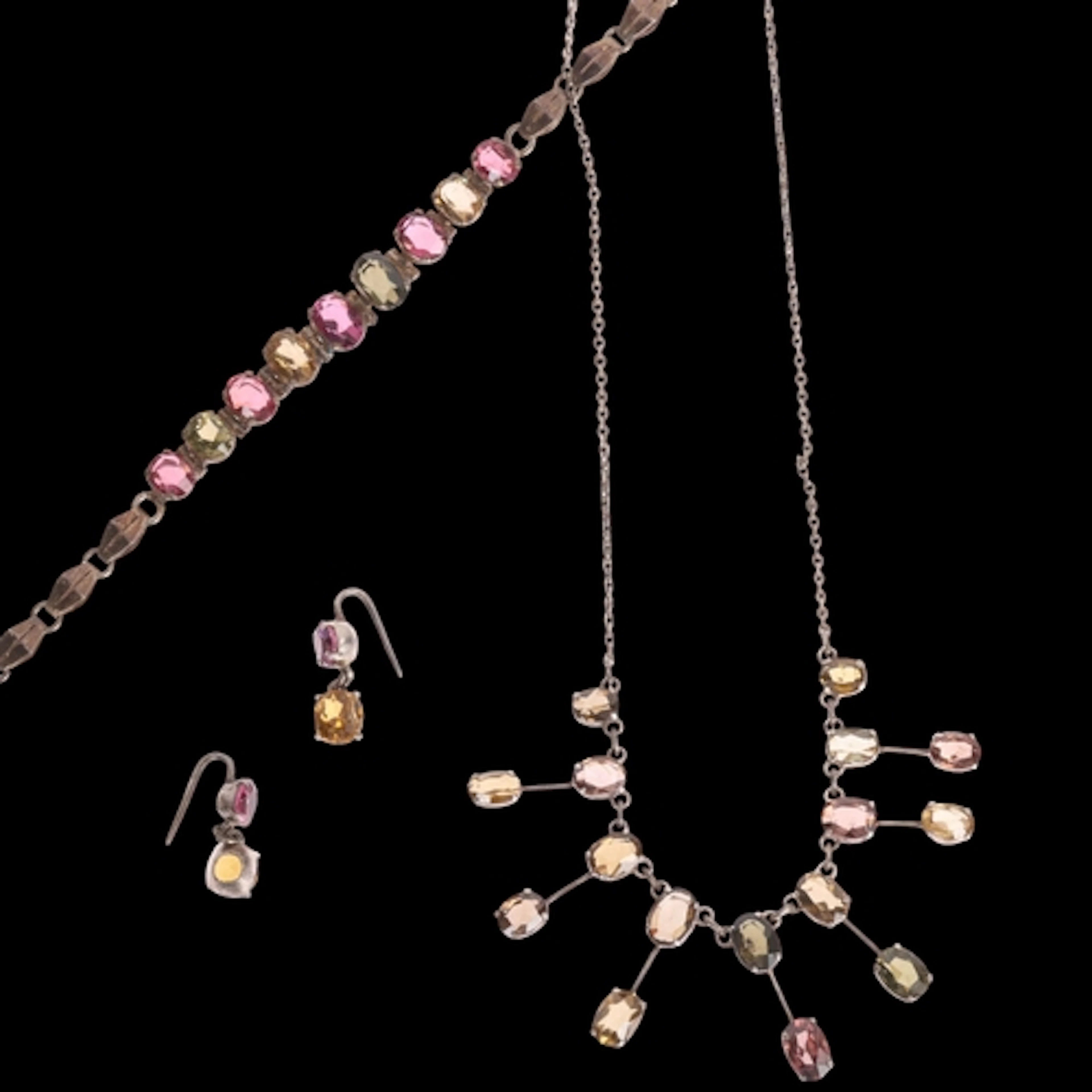 A silver vari-hue tourmaline demi-parure, comprising fringe ...