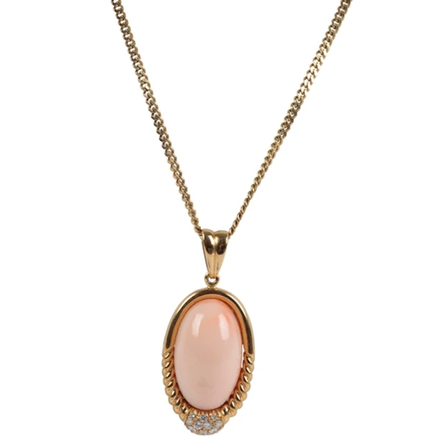 Bucherer, a coral and diamond pendant and chain, set with a ...