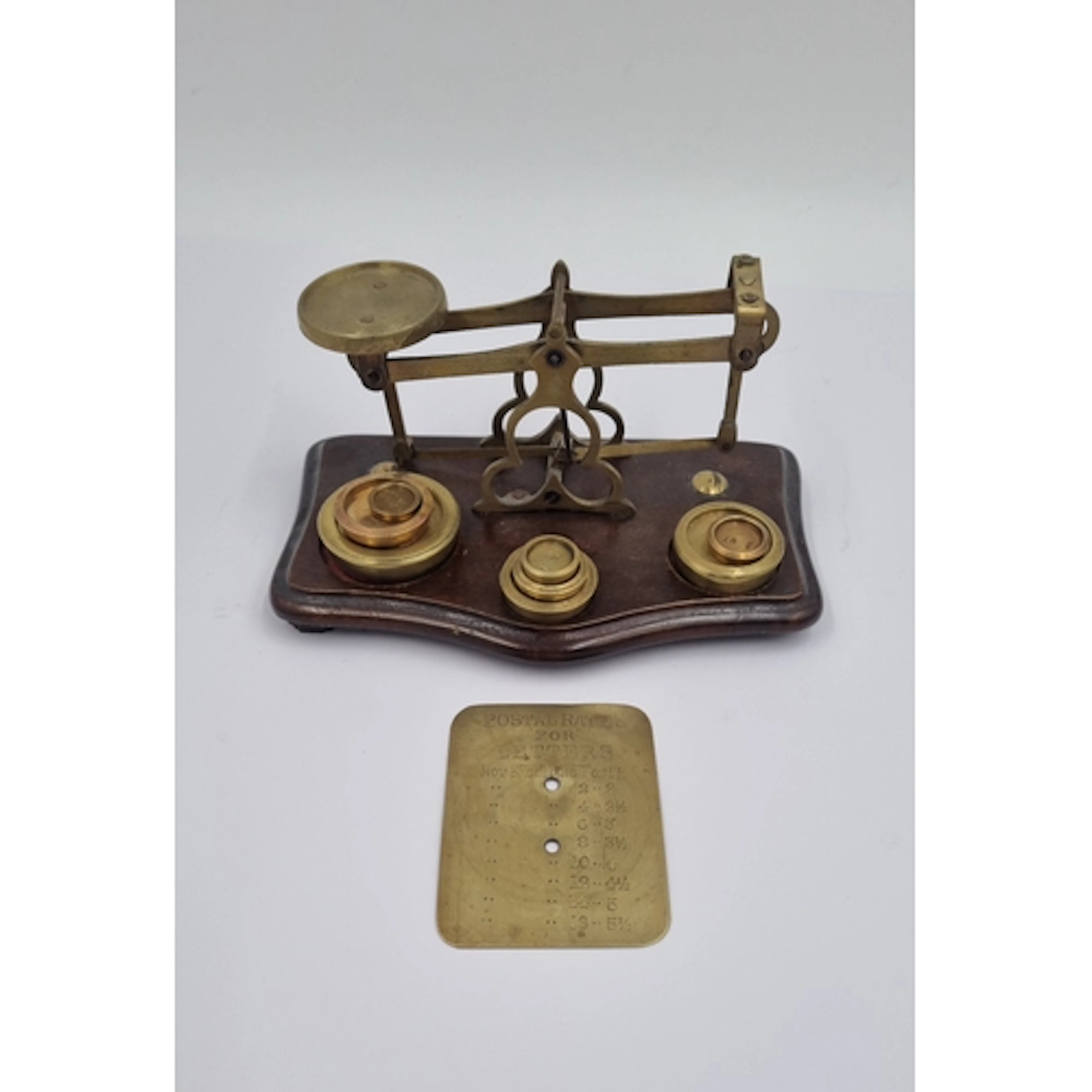 Vintage brass postal scales and weights