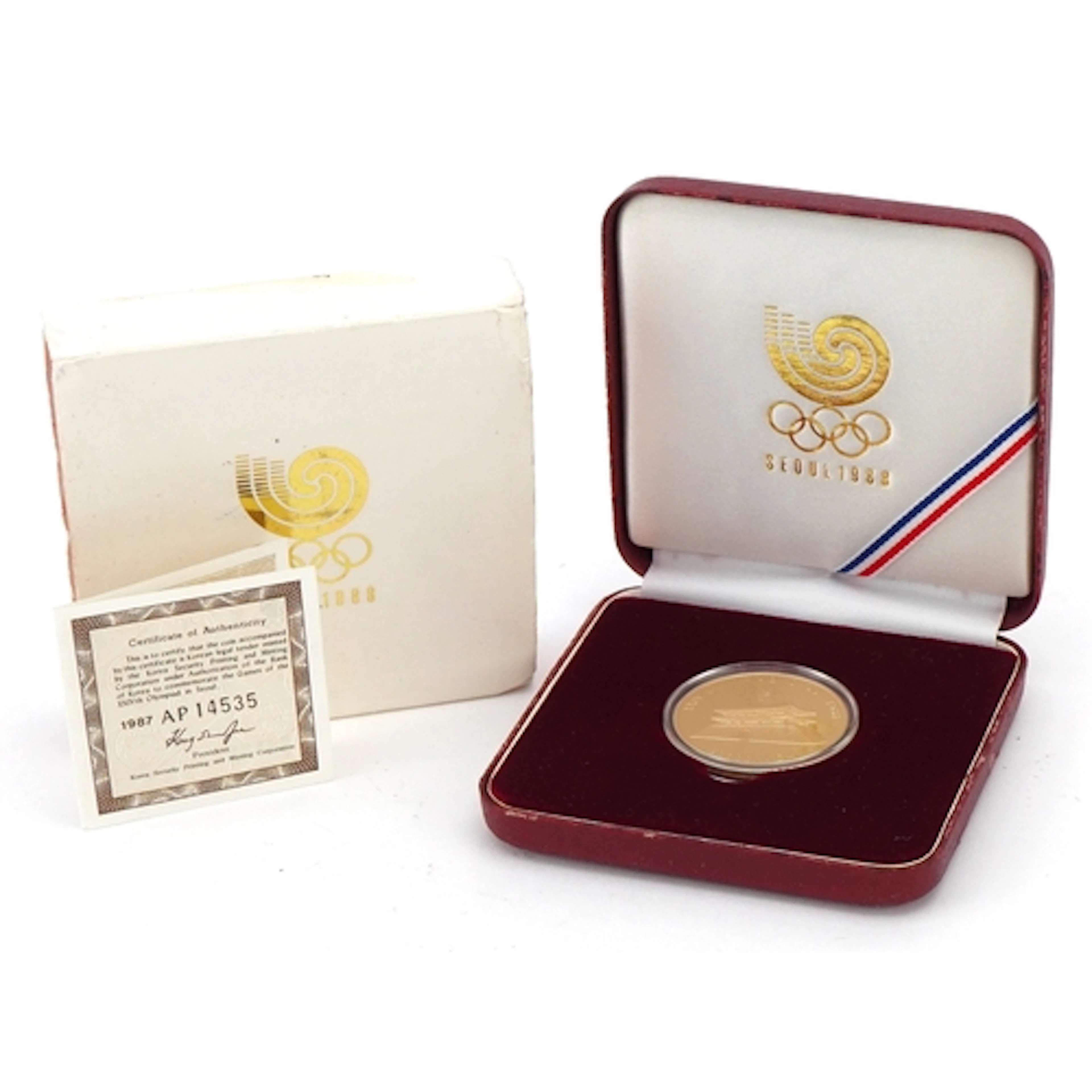 A 1988 Korean Seoul Olympics gold proof 50000 Won coin with...