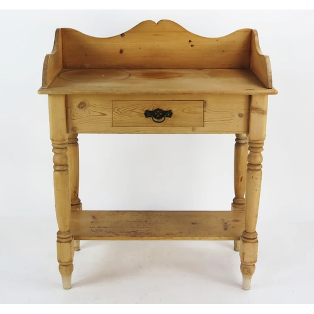 A Victorian pine washstand, with curved galleried back, sing...