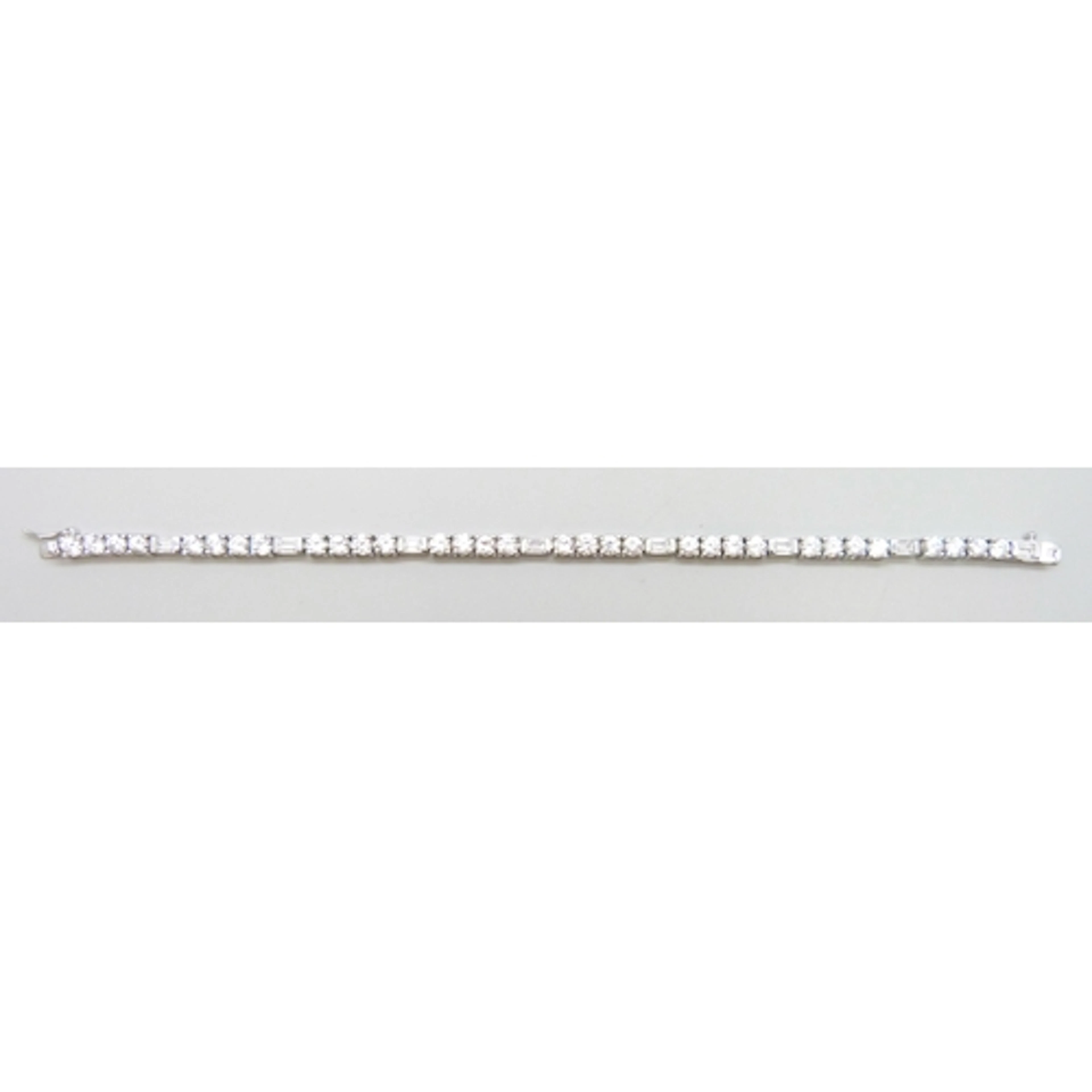 A DQCZ silver tennis bracelet set with clear stones, 19cm