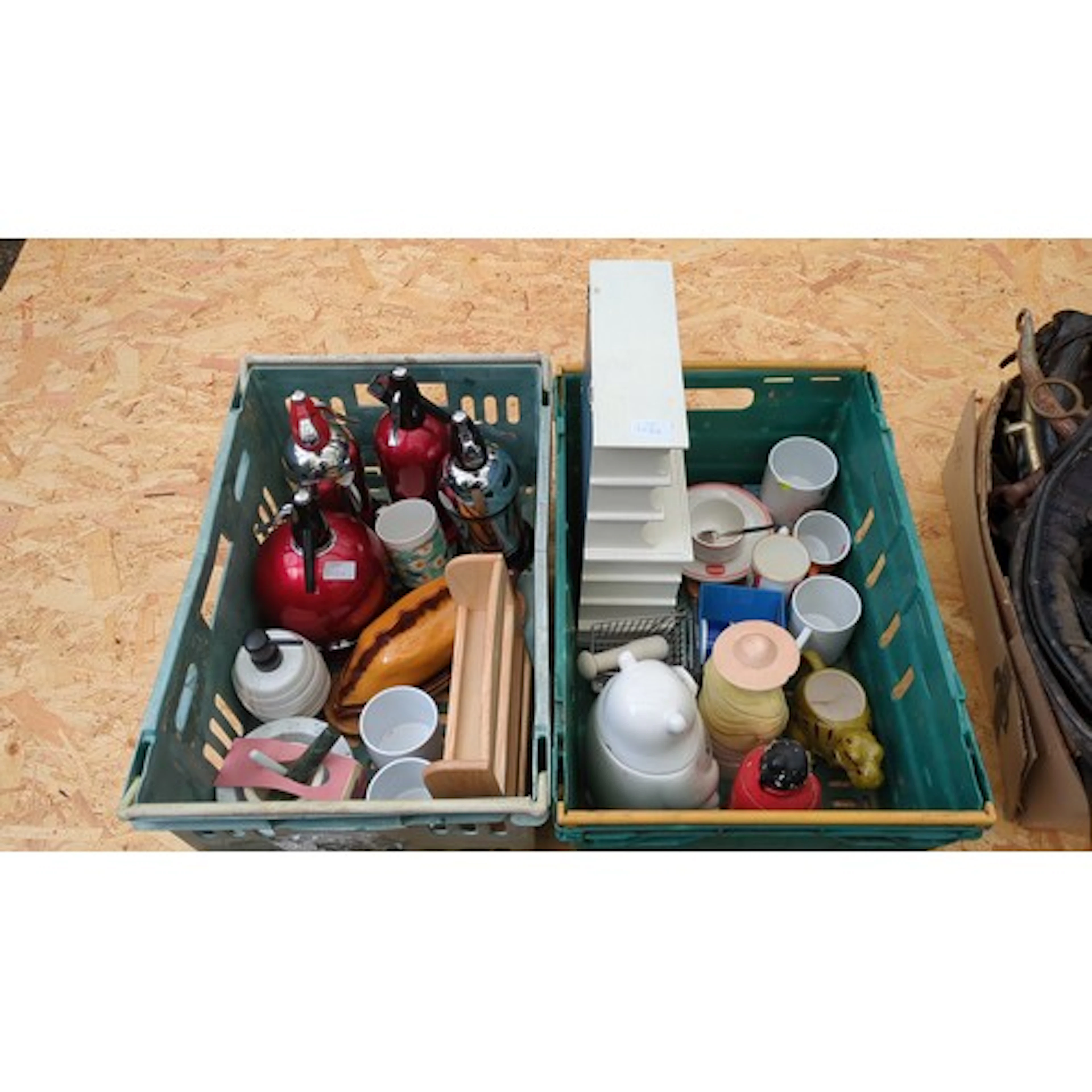 A group of domestic and decorative wares including red metal...