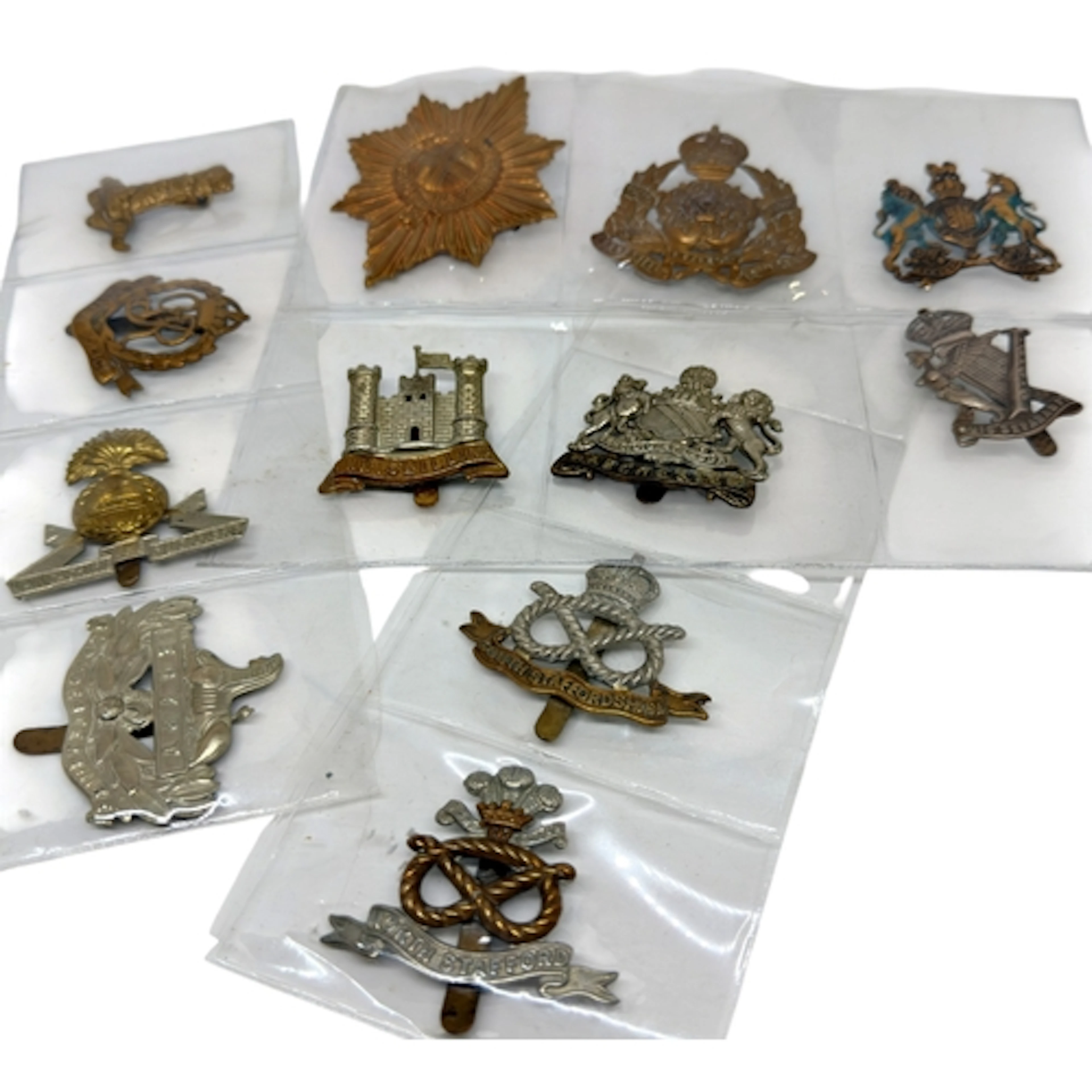 Twelve Military cap badges - Coldstream Guards, Derbyshire I...