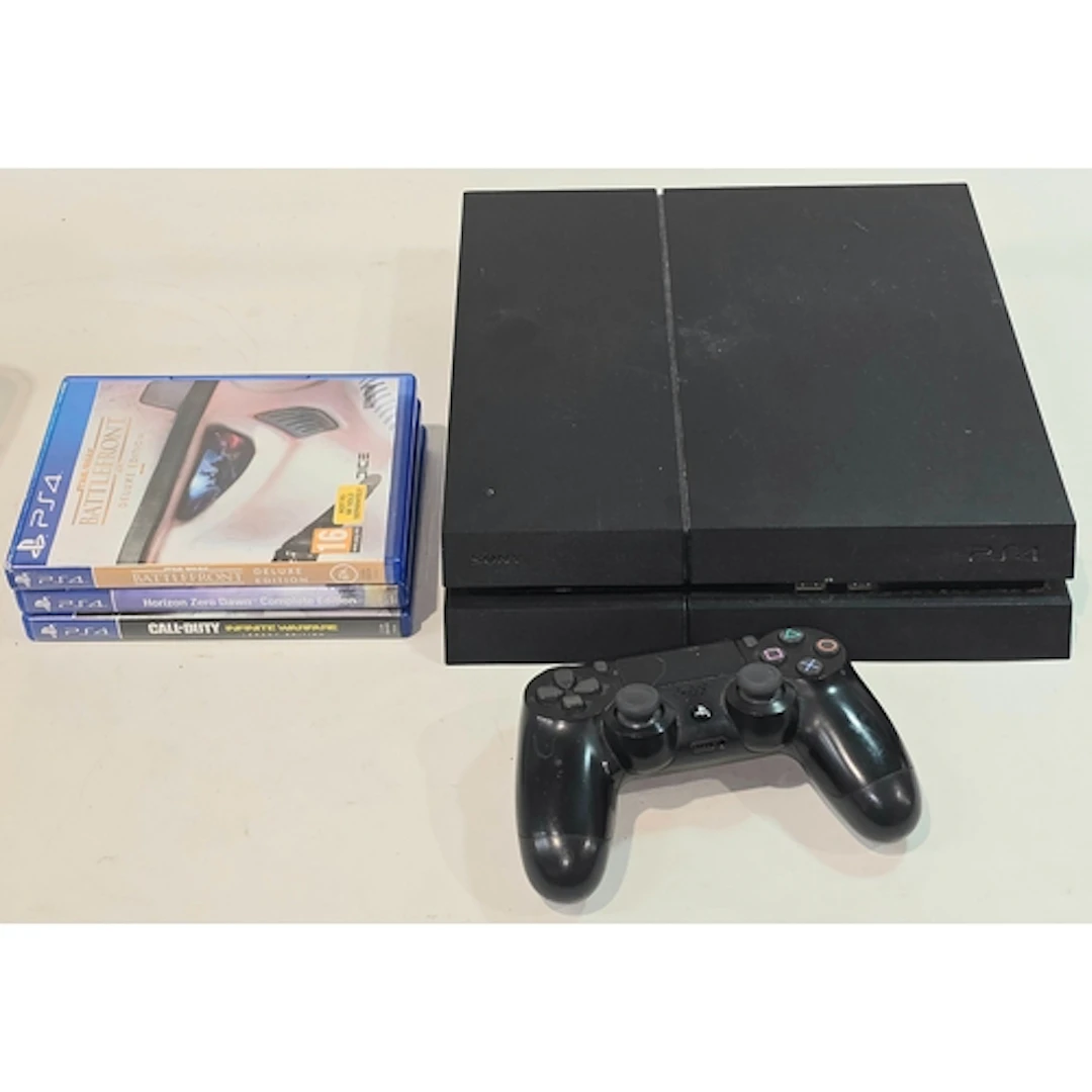 A Sony PS4 console together with one controller and three ga...
