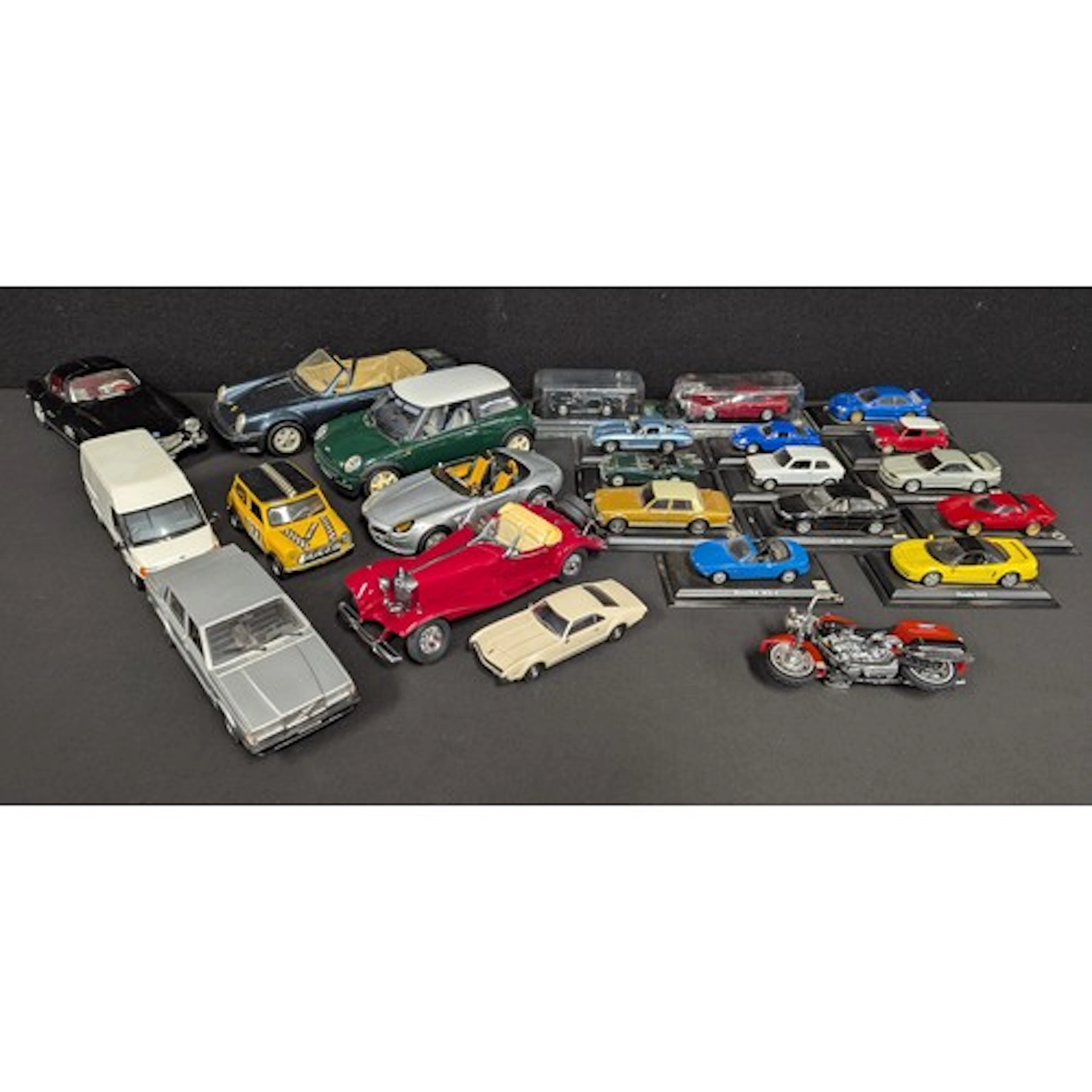 Various modern die cast model cars, mostly Burago, including...