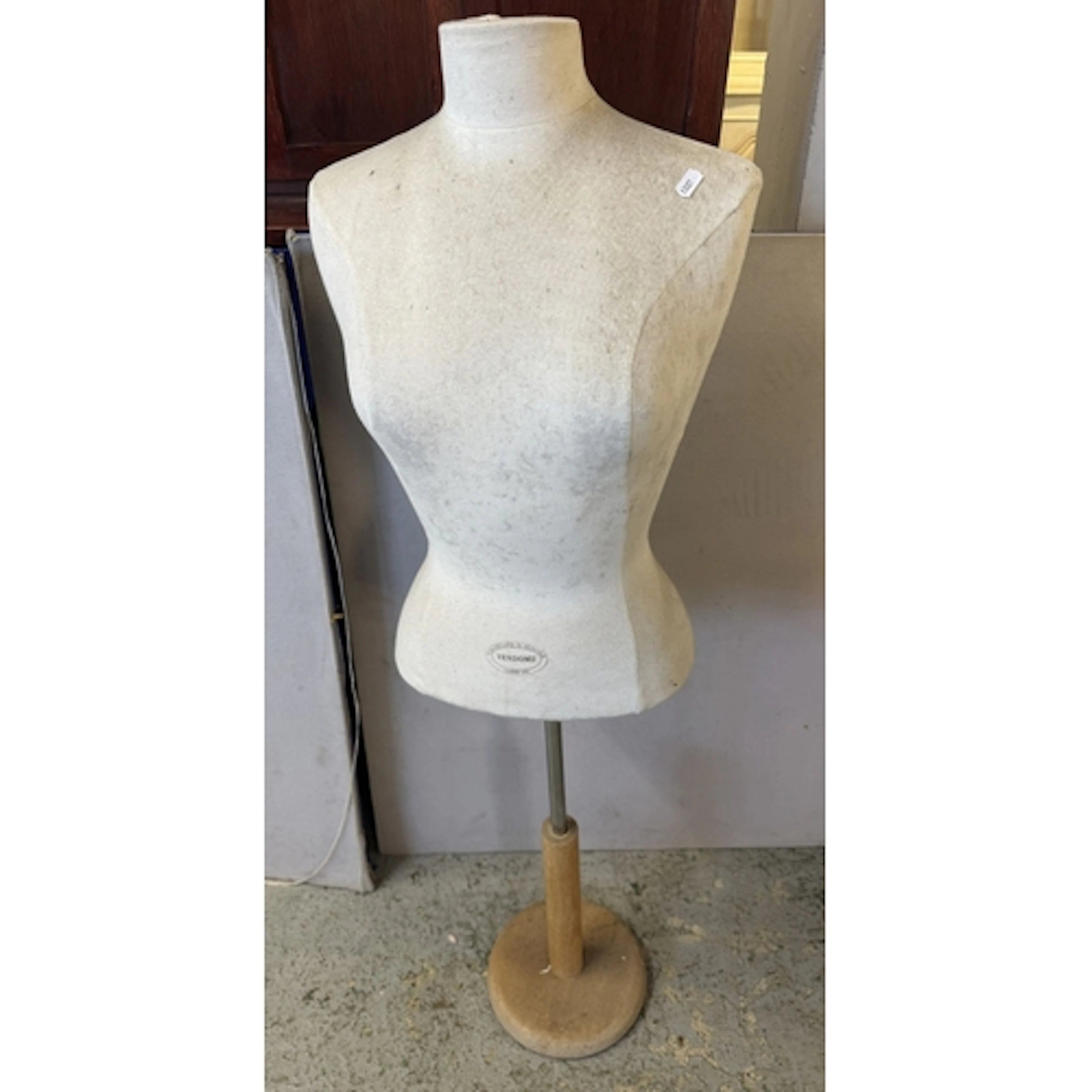 Female Mannequin with label for Faubourg Saint Honore Vendom...