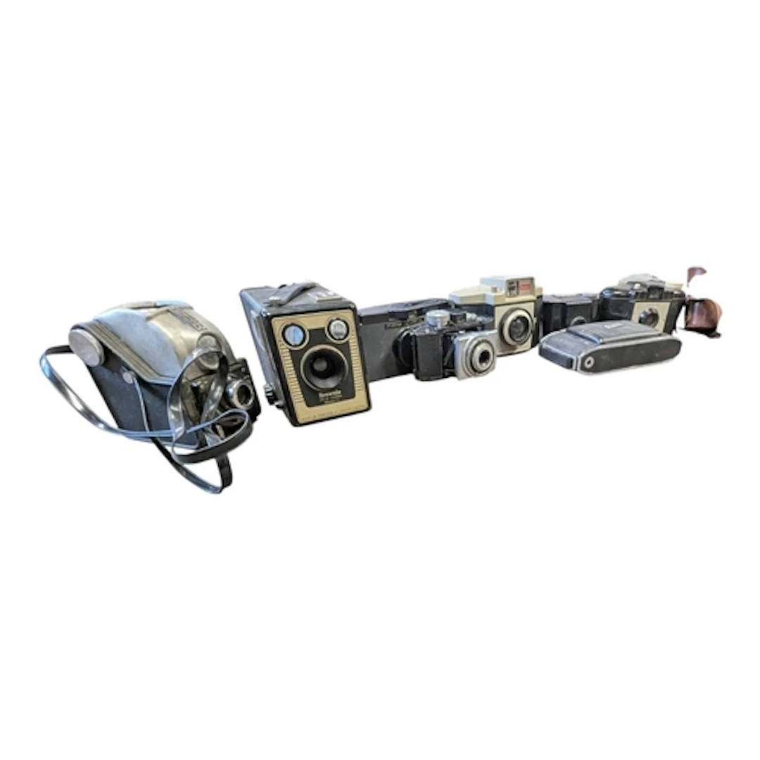 A collection of vintage 20th century cameras. The collection...