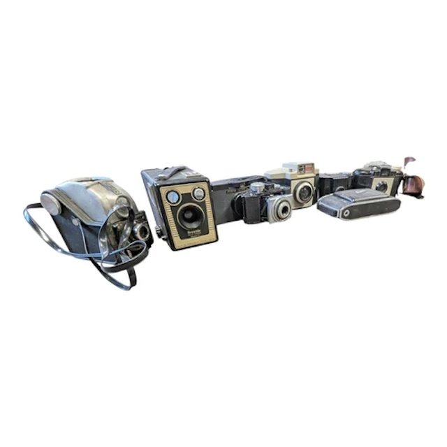 A collection of vintage 20th century cameras. The collection...