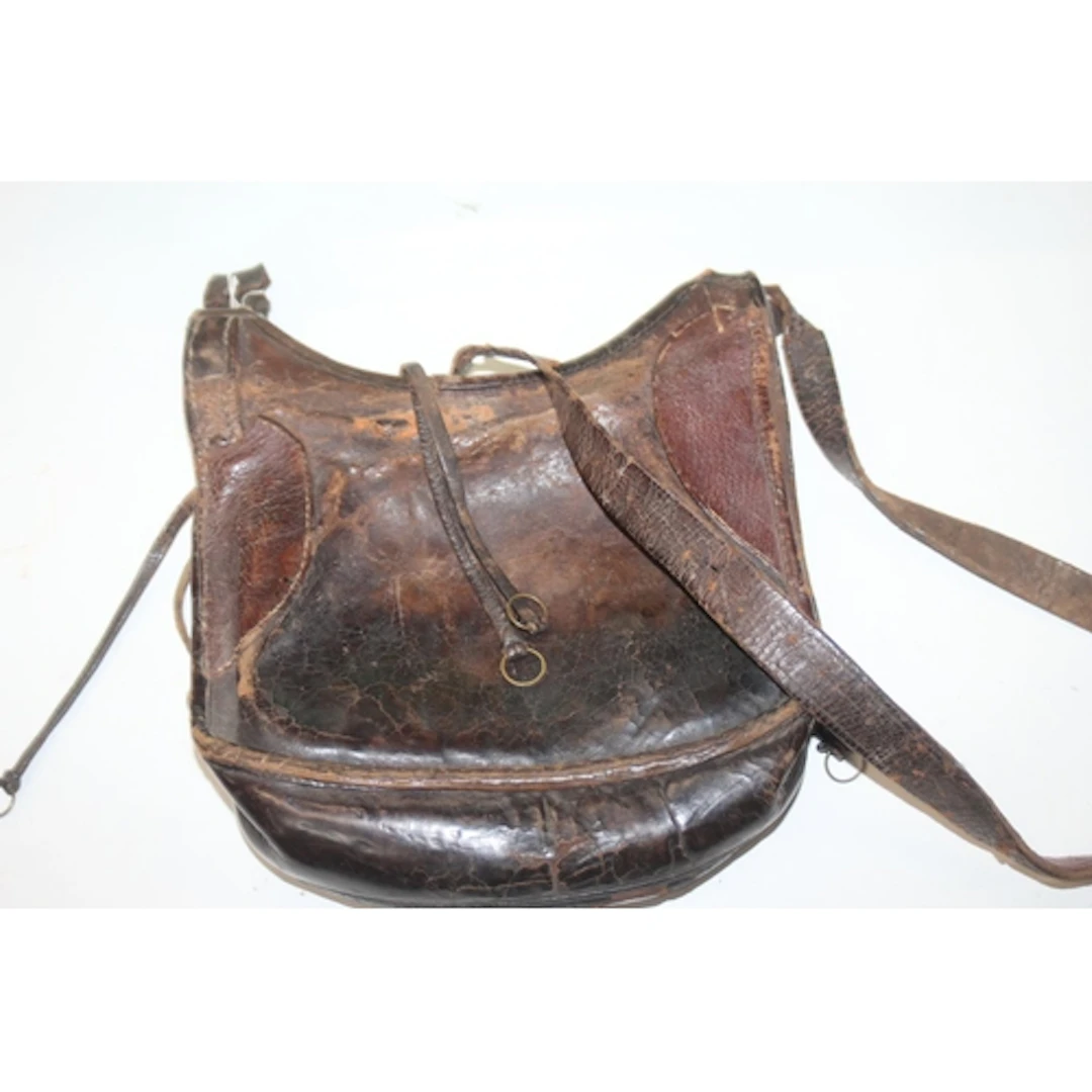 Early American brown leather shoulder bag or satchel.
