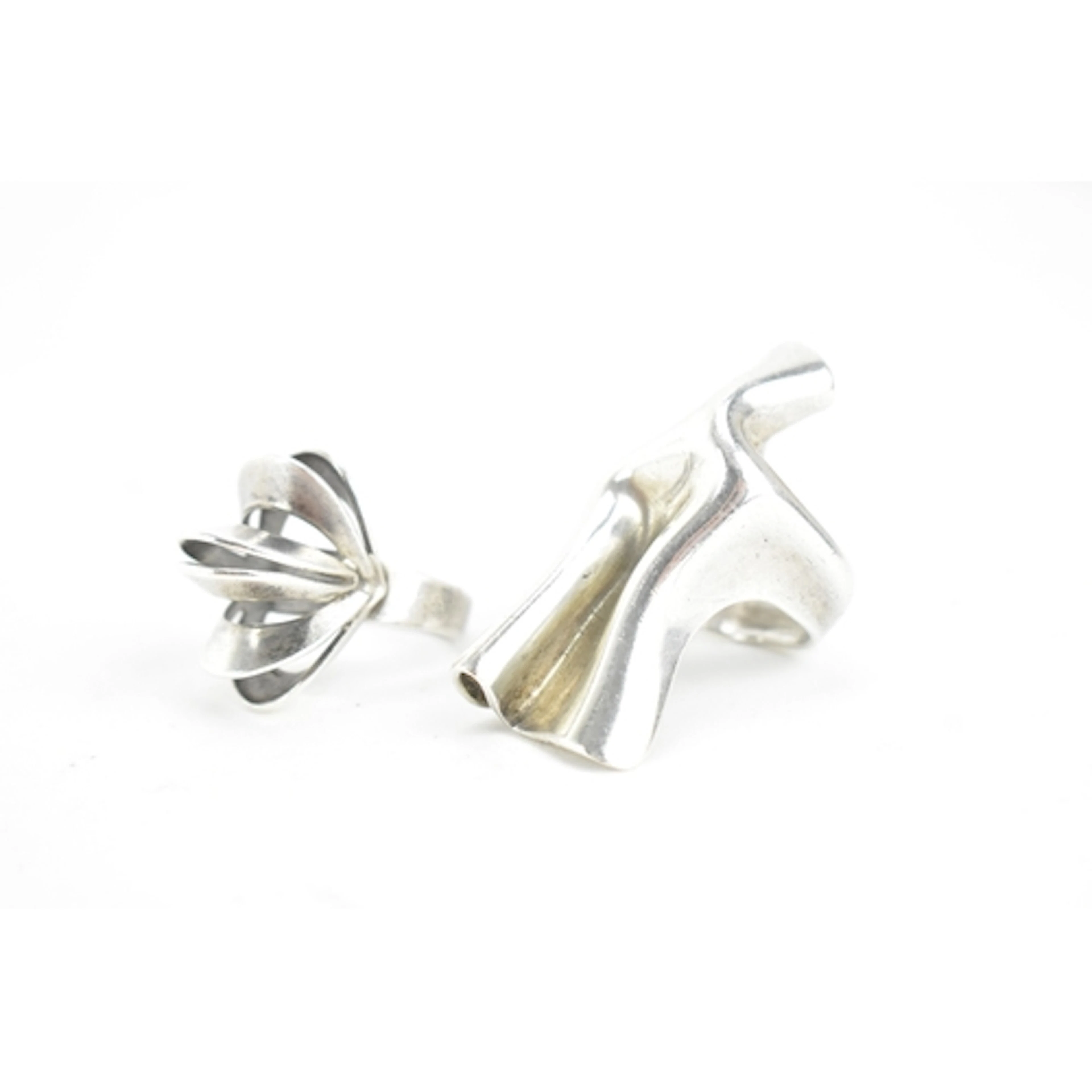 Two modernist (brutalist) designer silver rings bought at th...