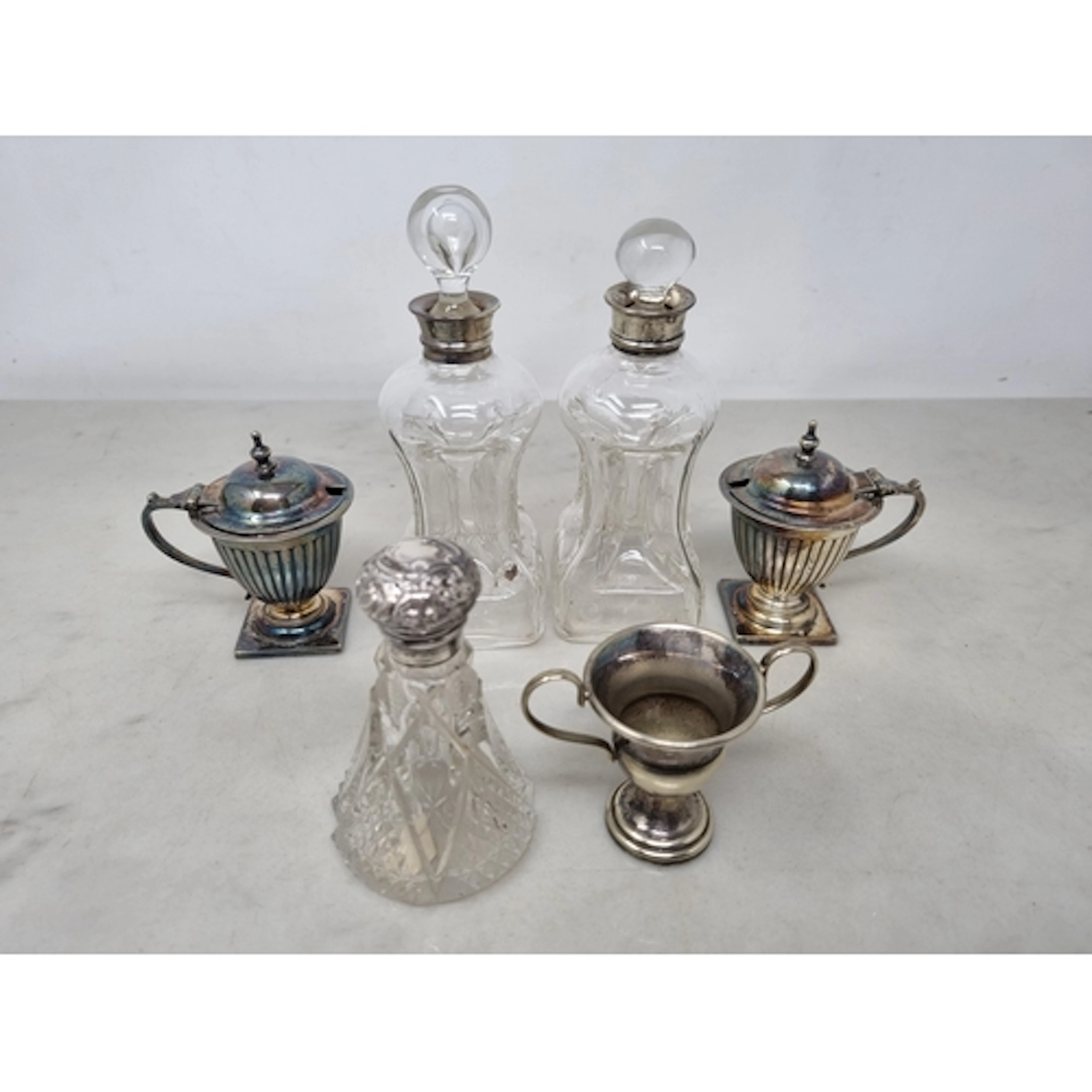 A pair of George V silver mounted glass Spirit Flasks, Birmi...