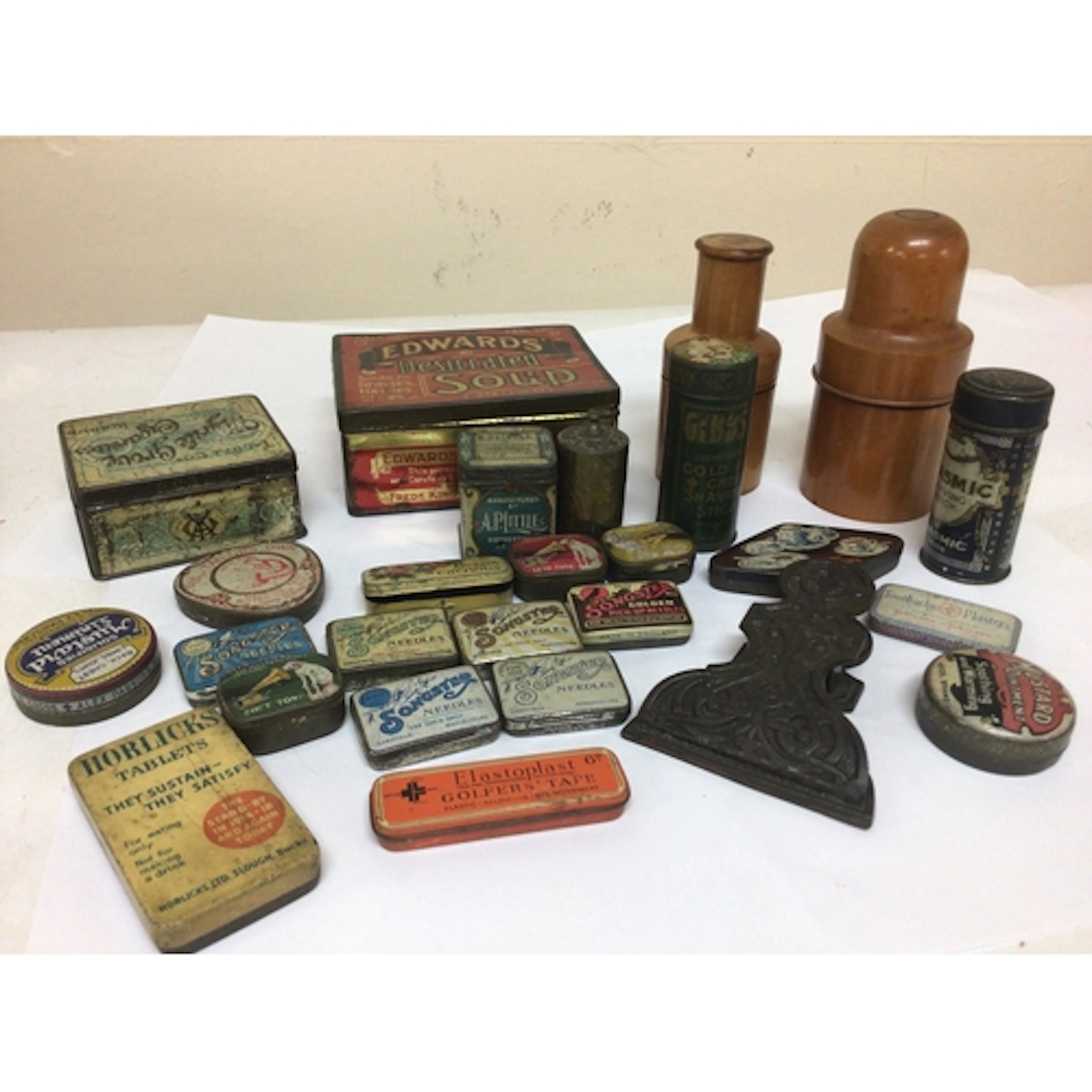 A collection of Vintage gramophone needle tins and oth...