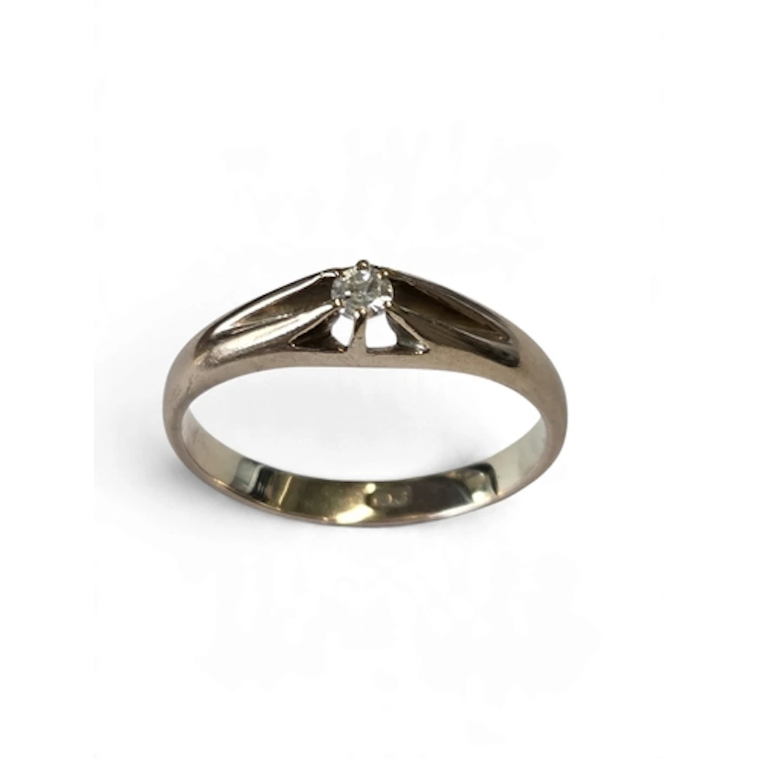 A 9-carat gold solitaire diamond ring, claw-set with a singl...