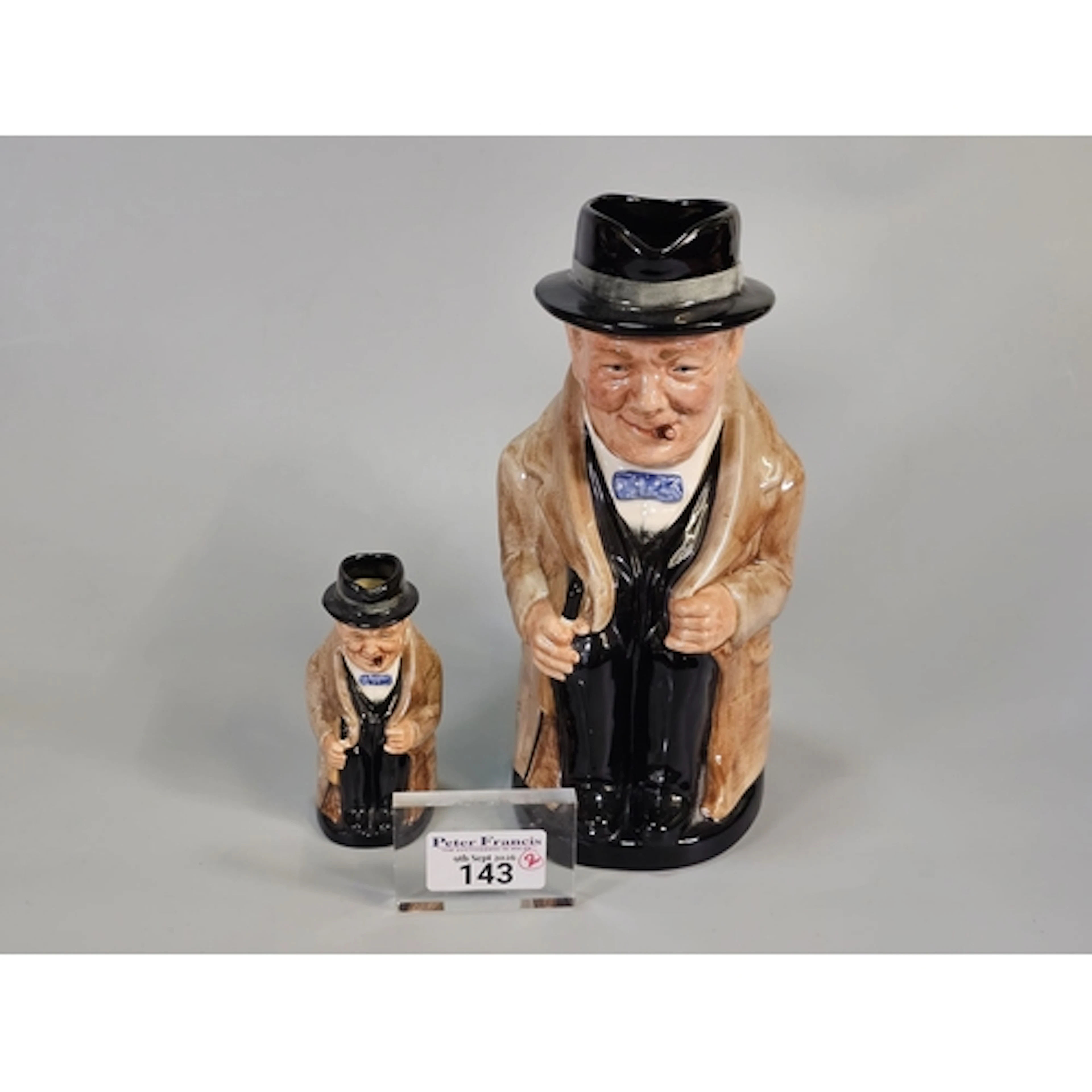 Large Royal Doulton Winston Churchill Toby Jug, together wit...
