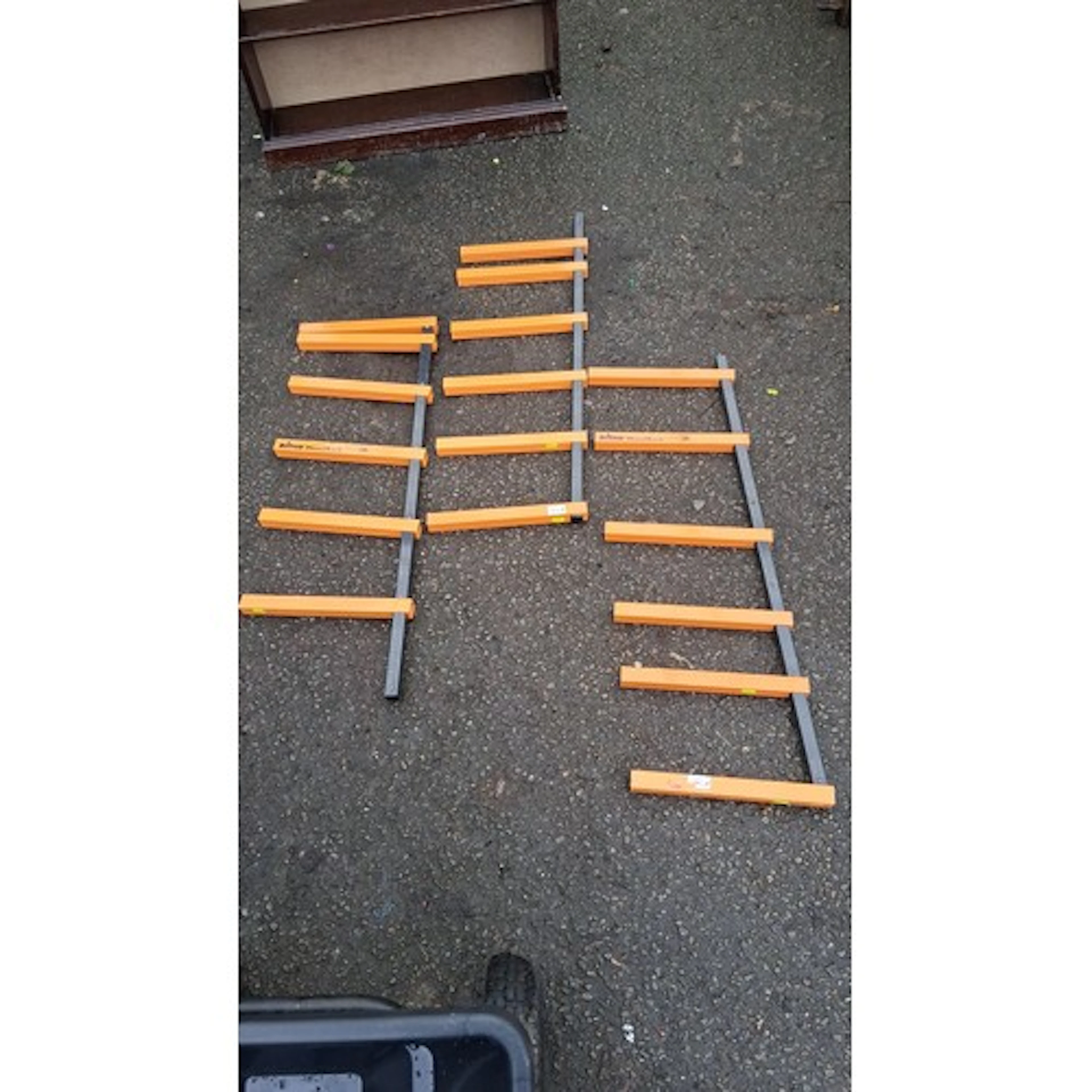 A group of Triton WoodRack wall-mounted storage rack compone...