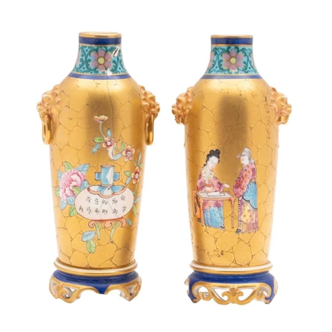 A pair of Royal Worcester 'Aesthetic' porcelain vases of sle...
