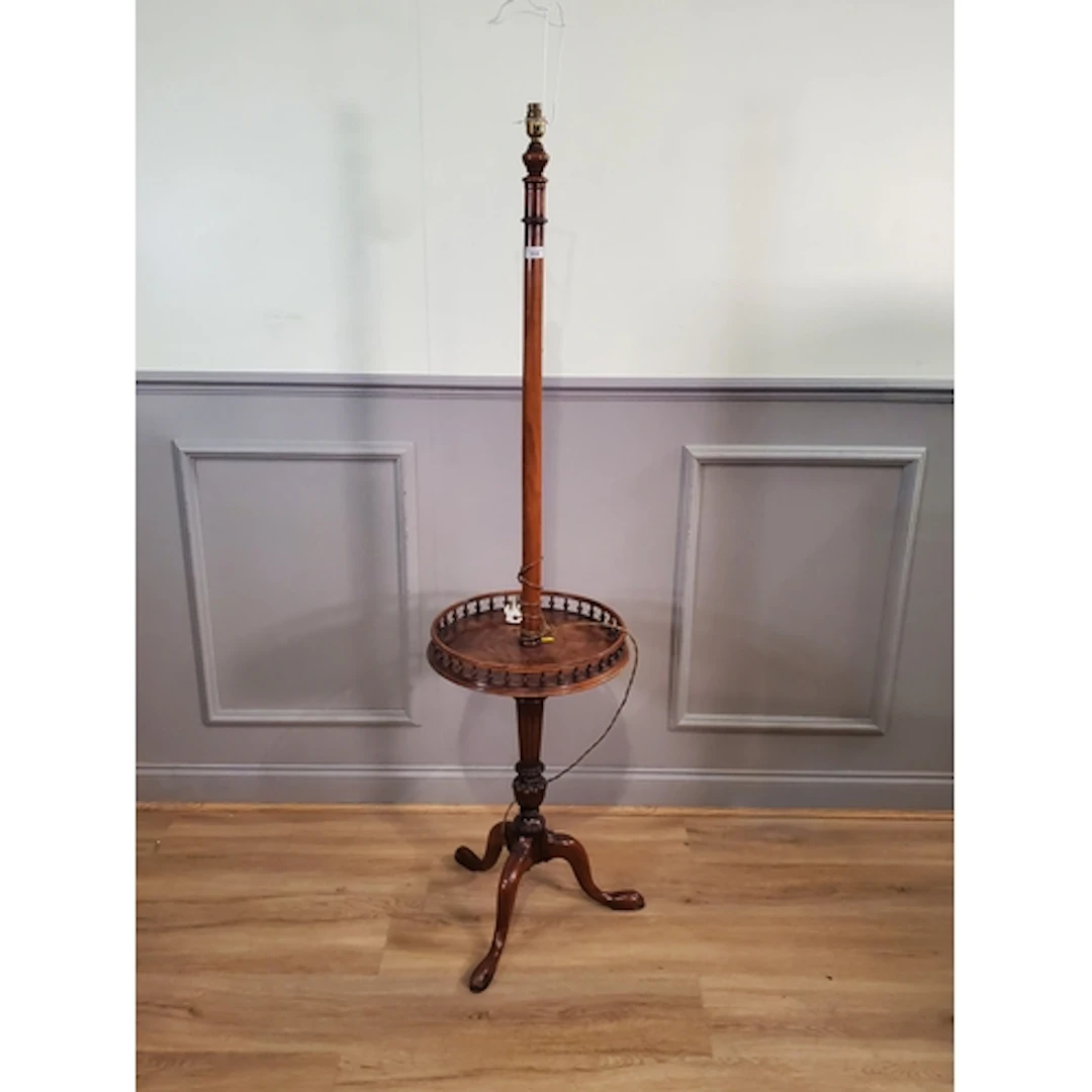 A walnut Standard Lamp Table, with galleried table, with tur...