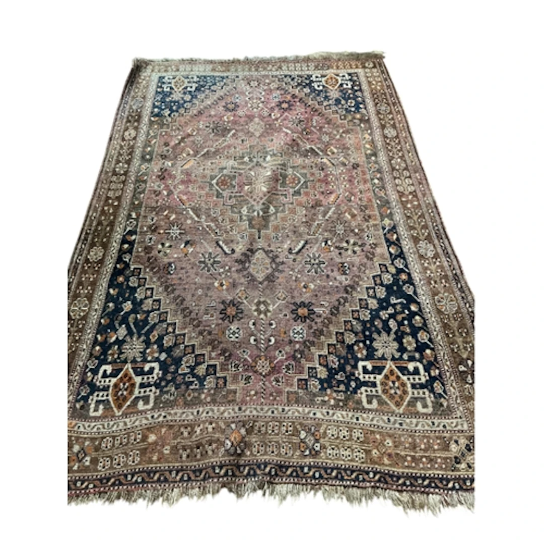 An antique Shiraz rug, 253 x 157cm