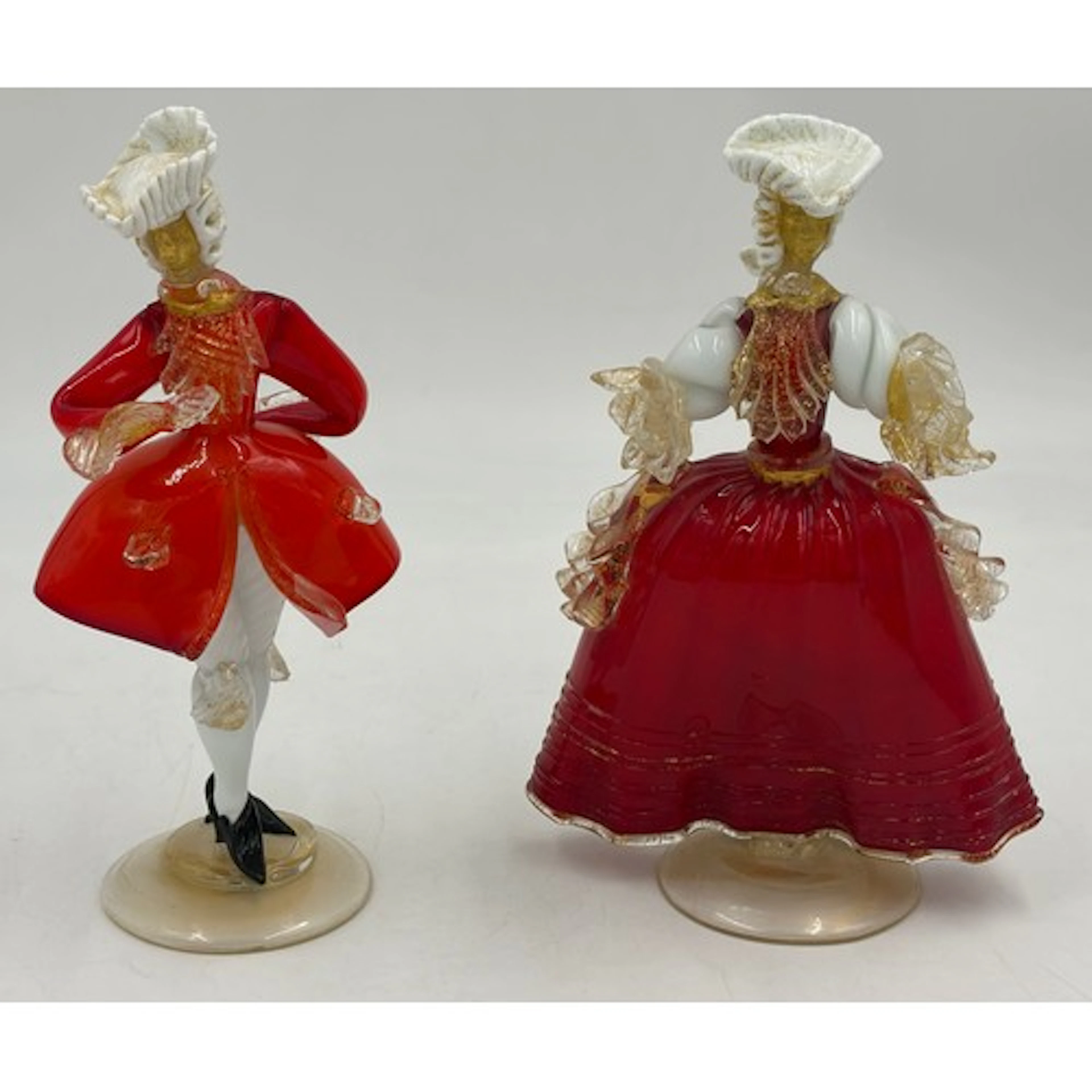 A pair of Venetian Murano glass Courtesan figurines. Tallest...