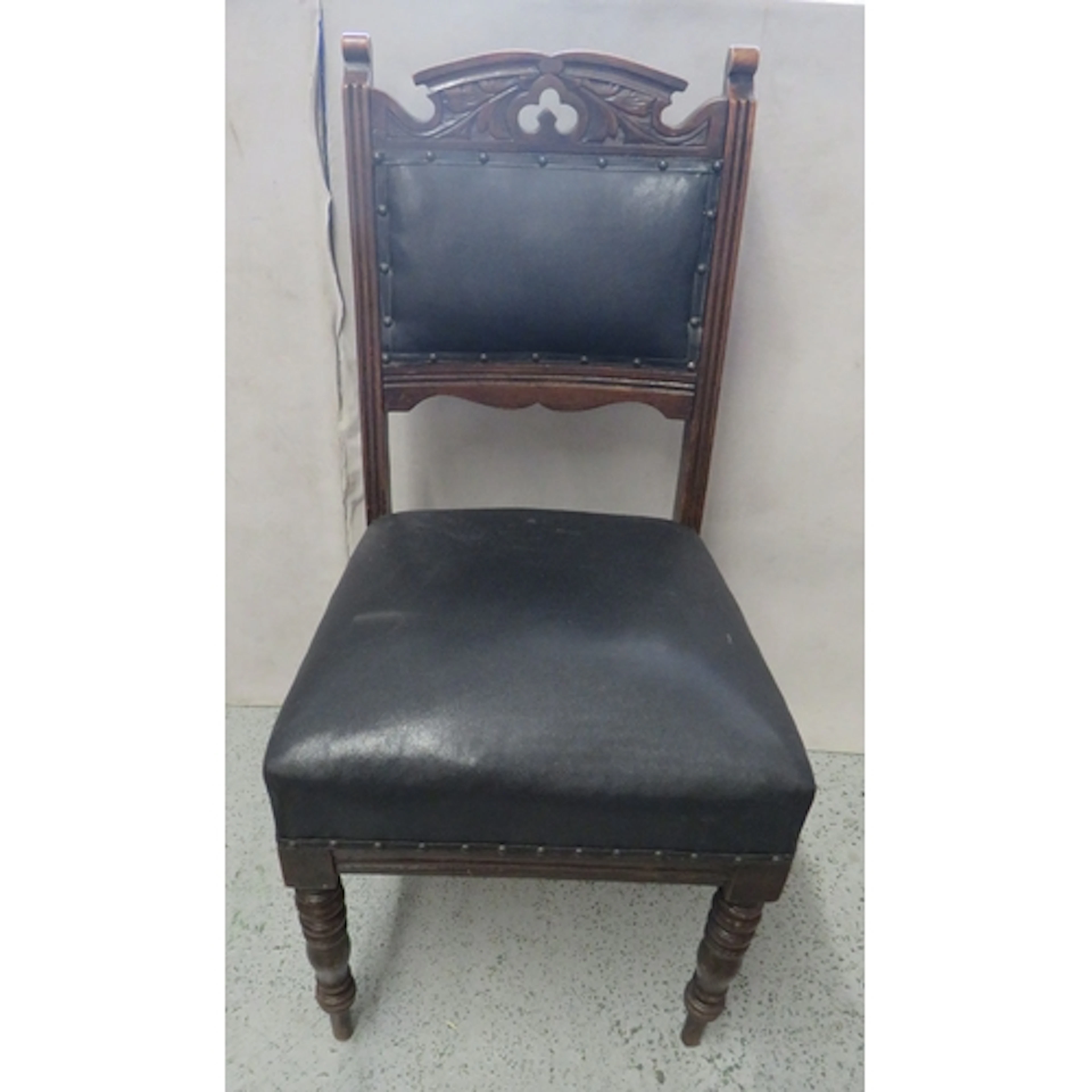 Antique Dark Wooden Carved Dining Chair with black leather s...