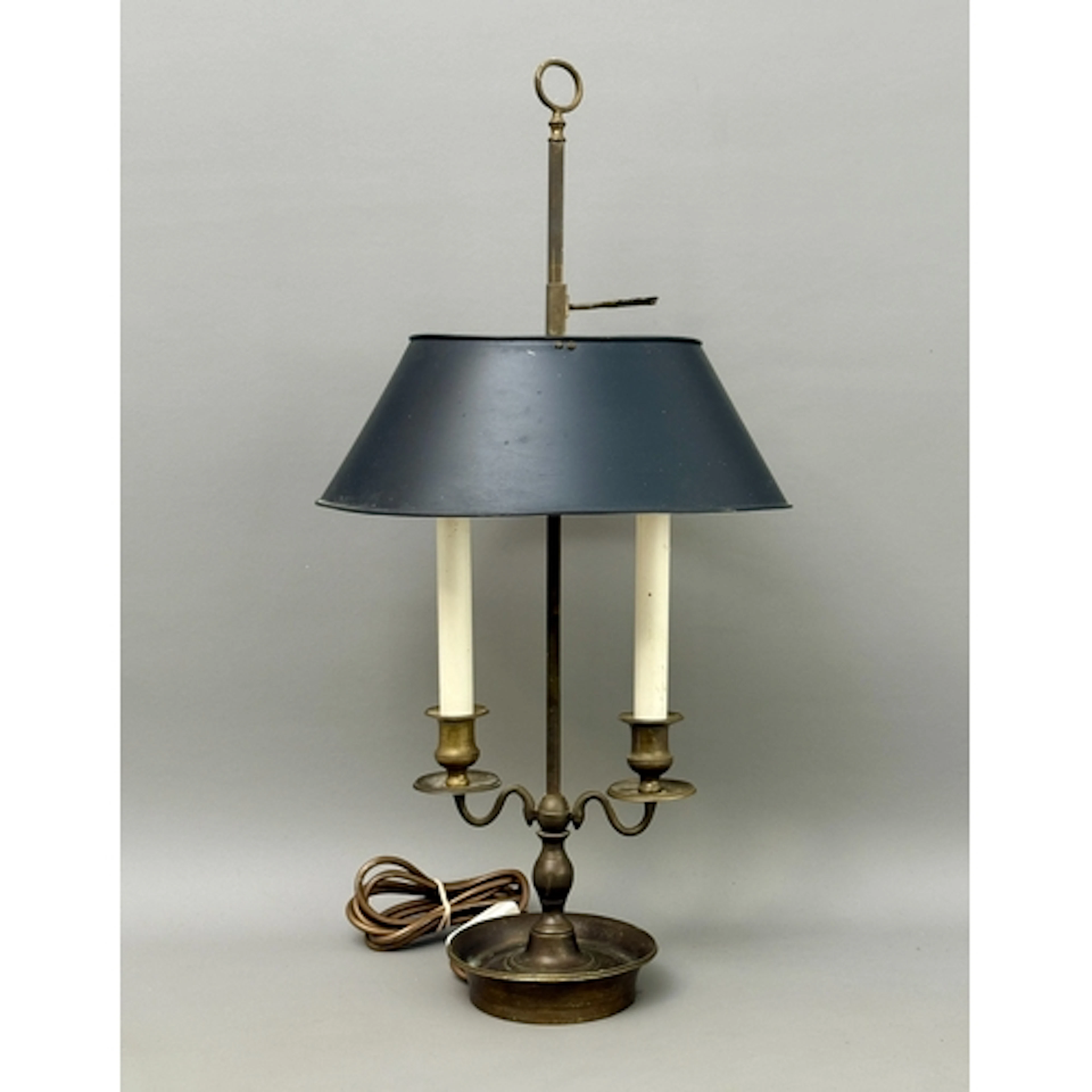 A modern French style metal bouillotte lamp - styled with tw...