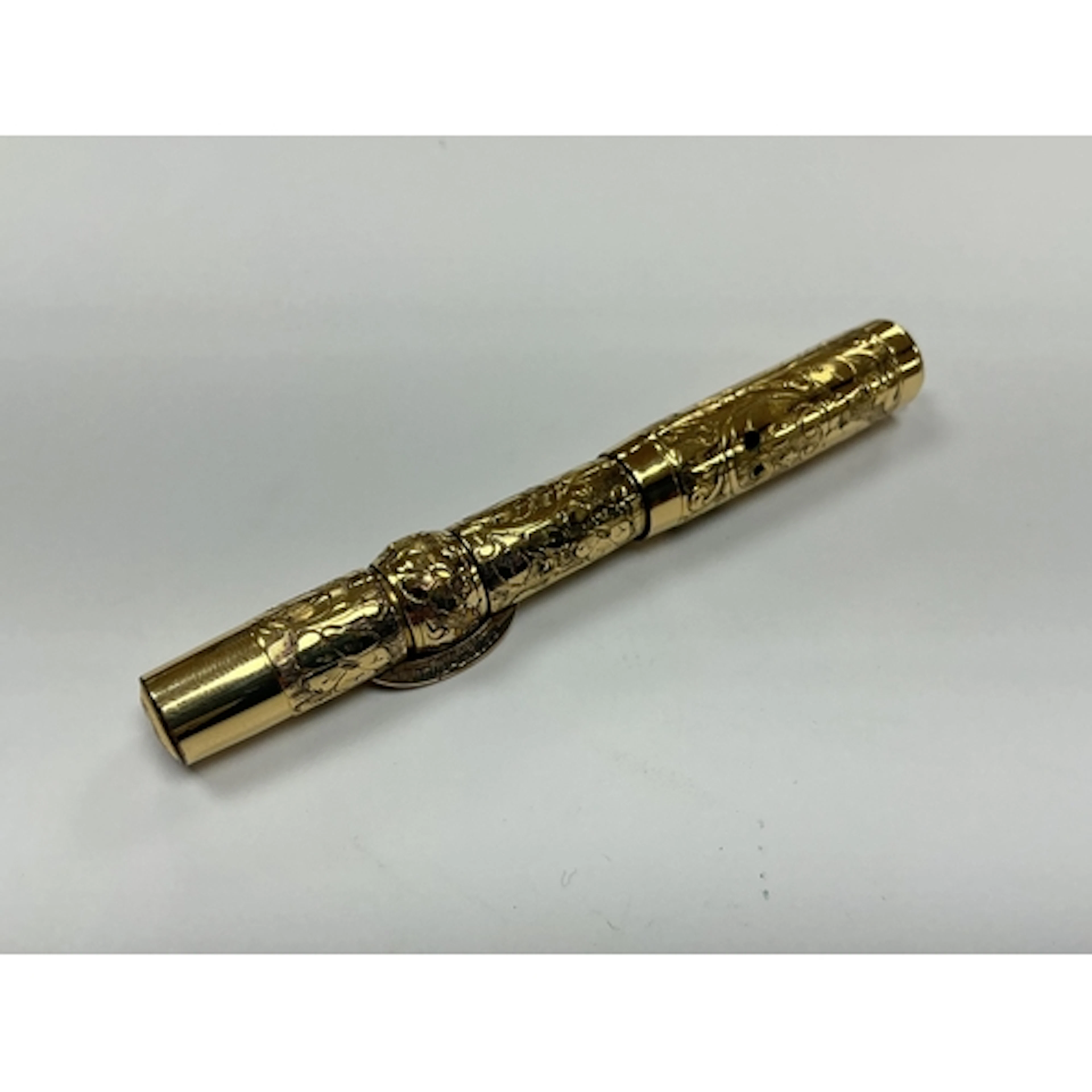 A Conklin G.F. floral engraved crescent filler