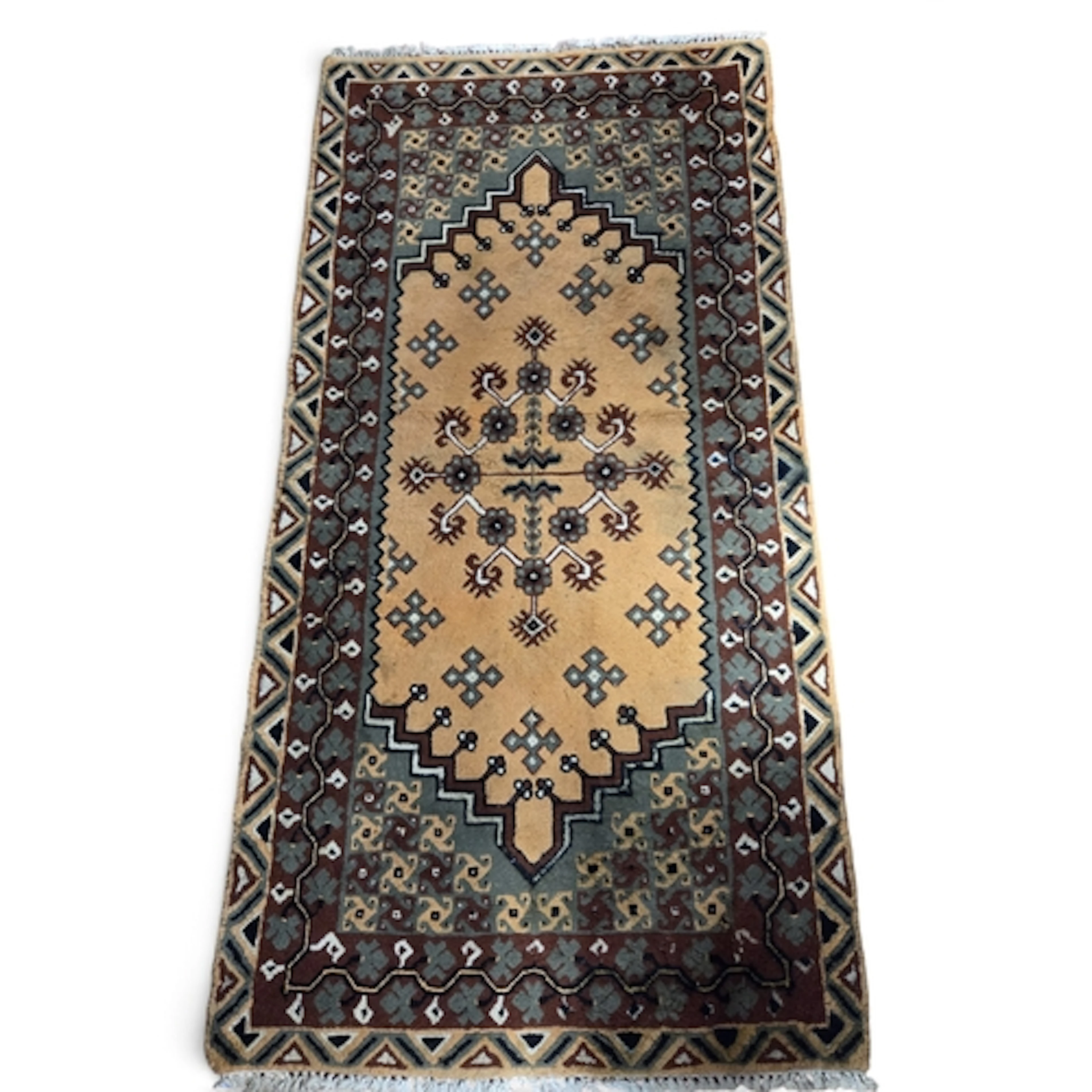 A Tunisian hand woven wool Rug with brown and rust tones. 20...
