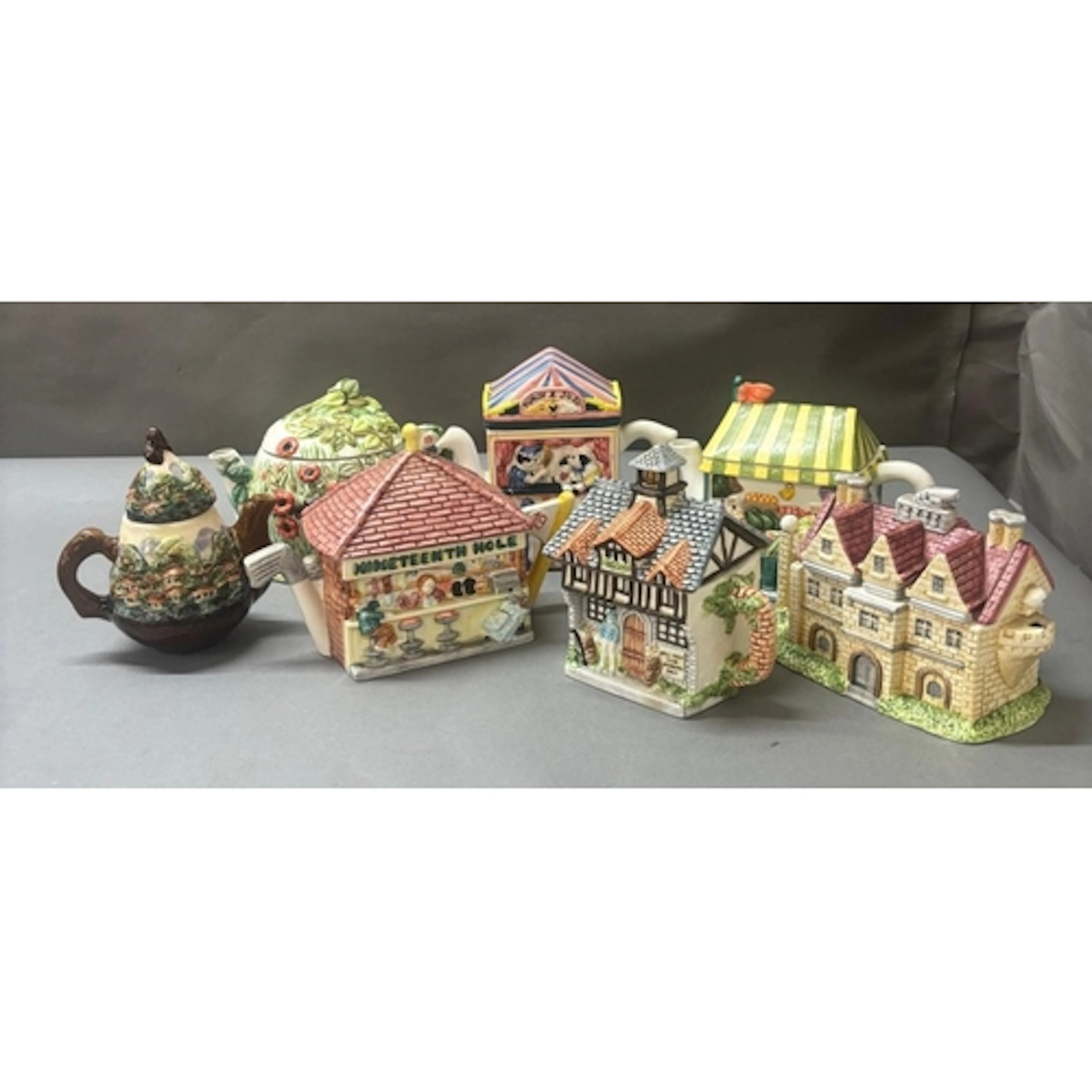 A selection of decorative teapots, various themes and makers...