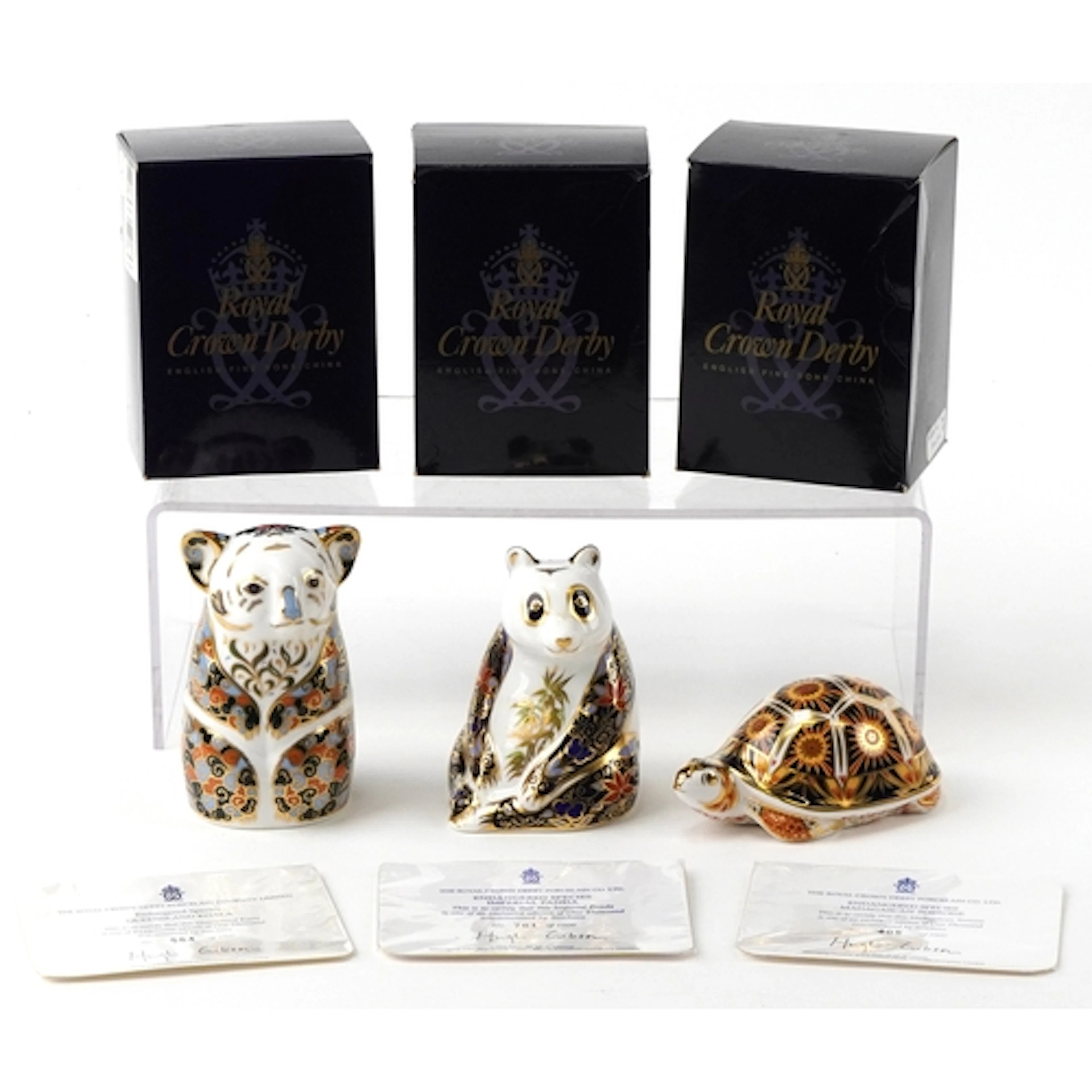 Three Royal Crown Derby paperweights from the Endangered Spe...