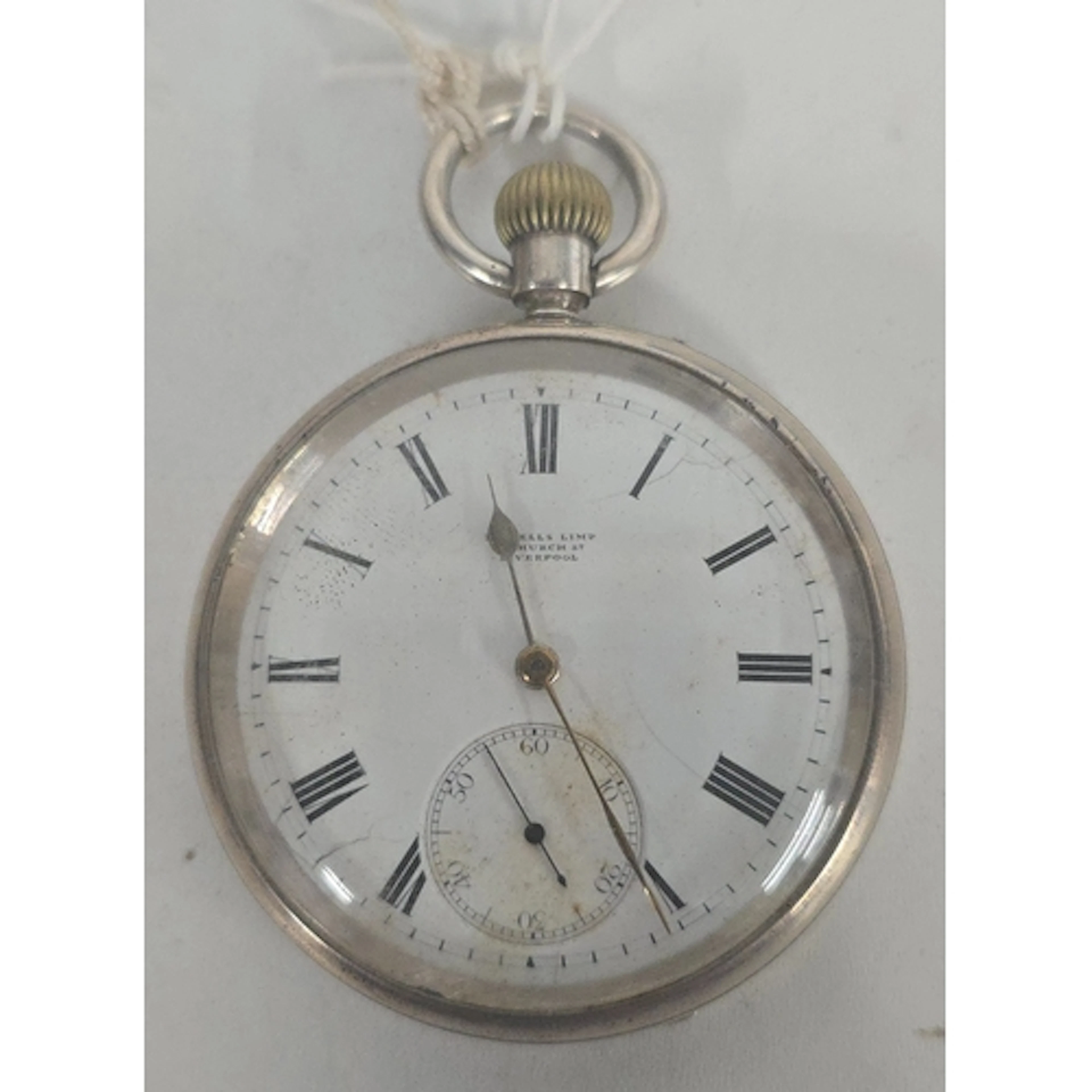 An English silver cased pocket watch by Russells Ltd., 18 Ch...