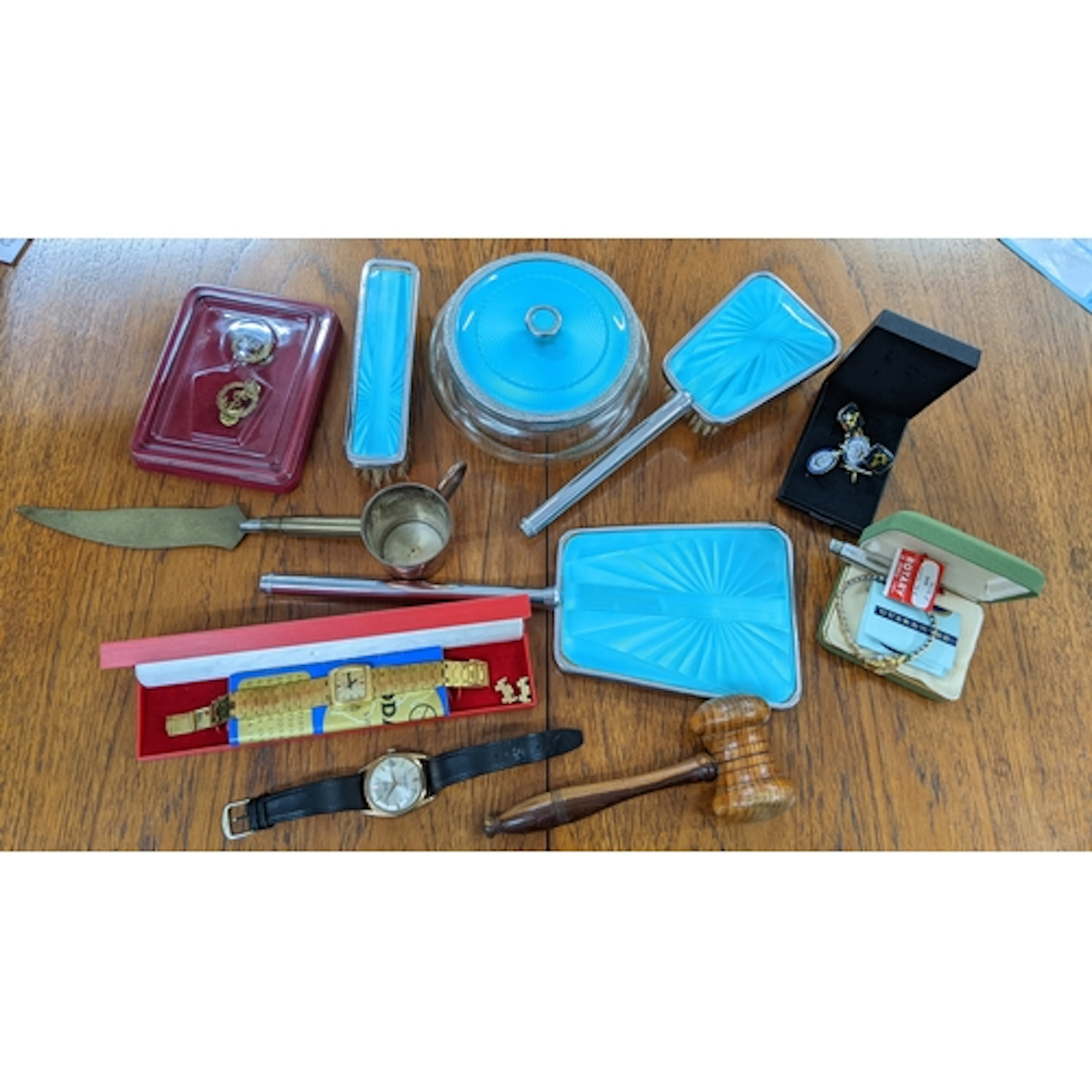 A mixed lot to include an enamelled dressing table set, Roda...