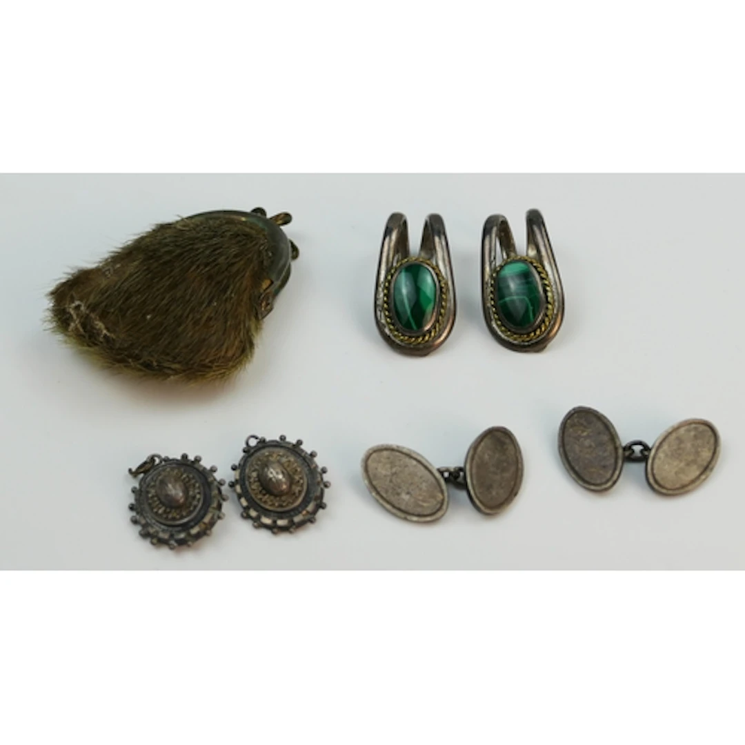 A small fur and metal mounted purse together with a pair of ...