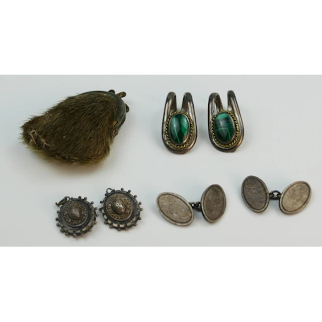 A small fur and metal mounted purse together with a pair of ...