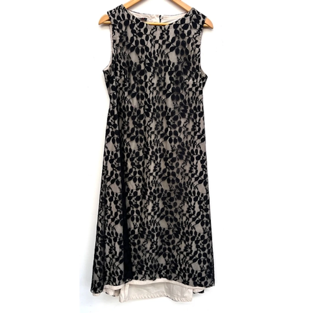 An Ishchiko black foliate lace dress with taupe lining, size...