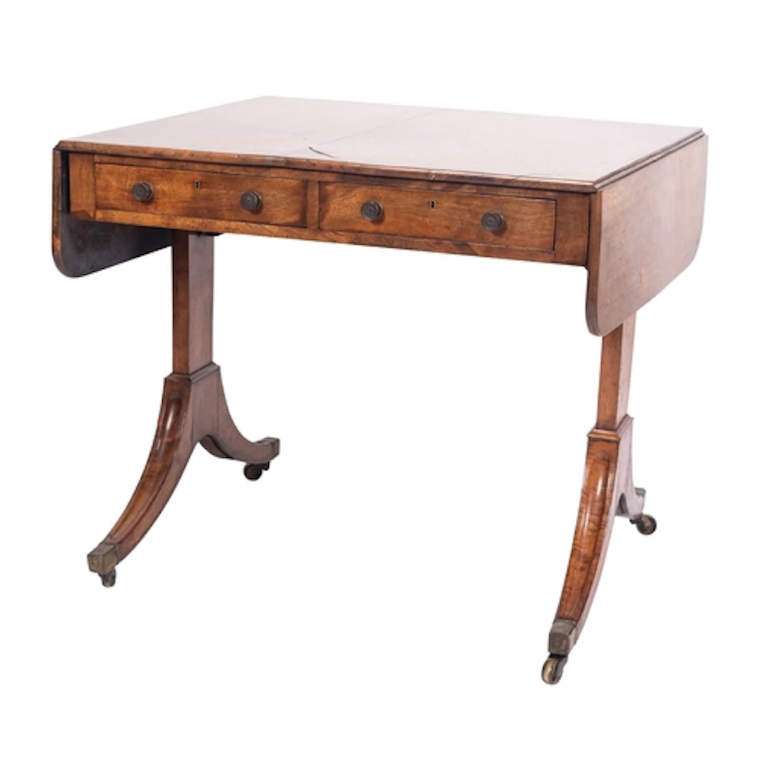 A George III mahogany sofa table, circa 1800; the rectangula...