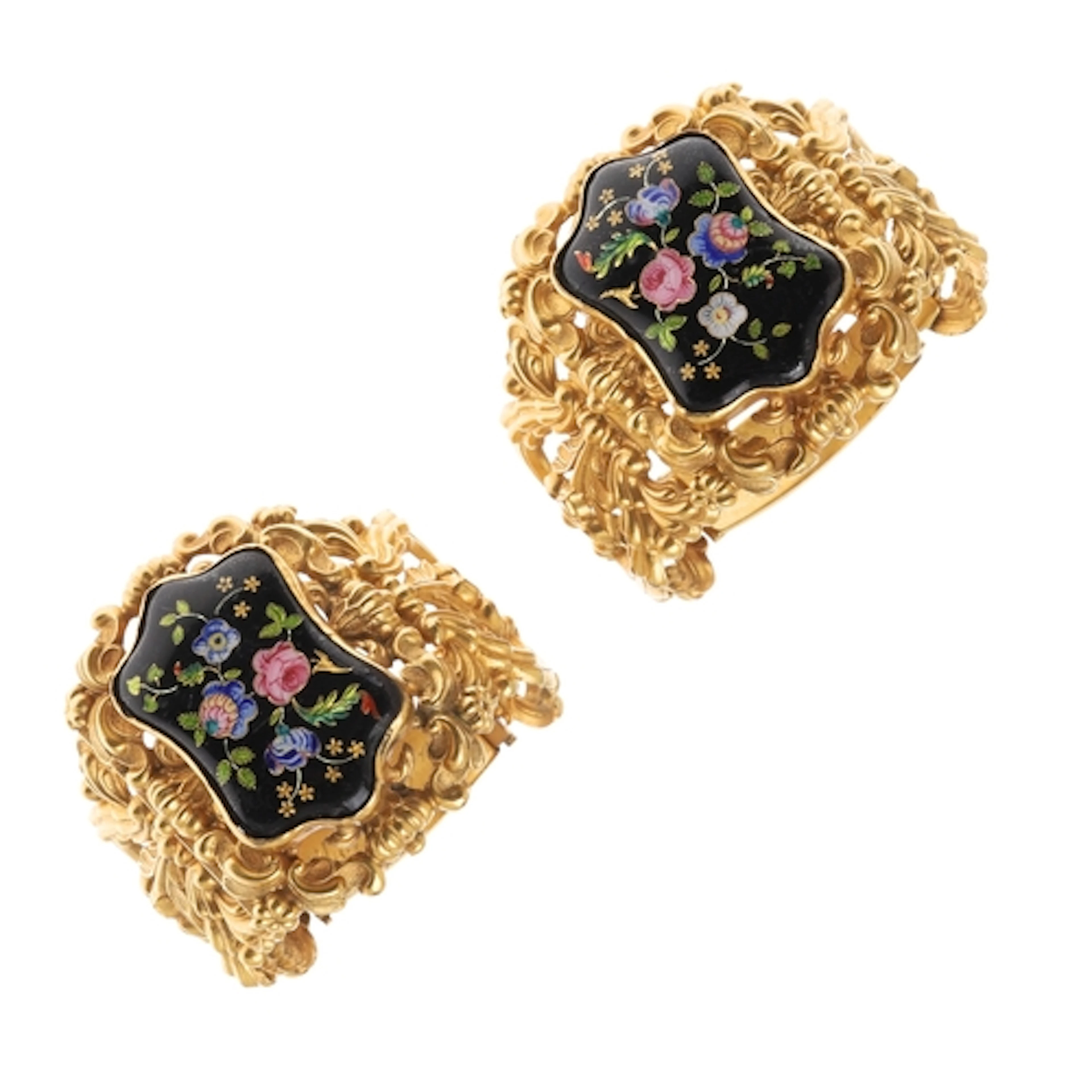 A PAIR OF 19TH CENTURY ENAMEL AND GILT BRACELETS. each of op...