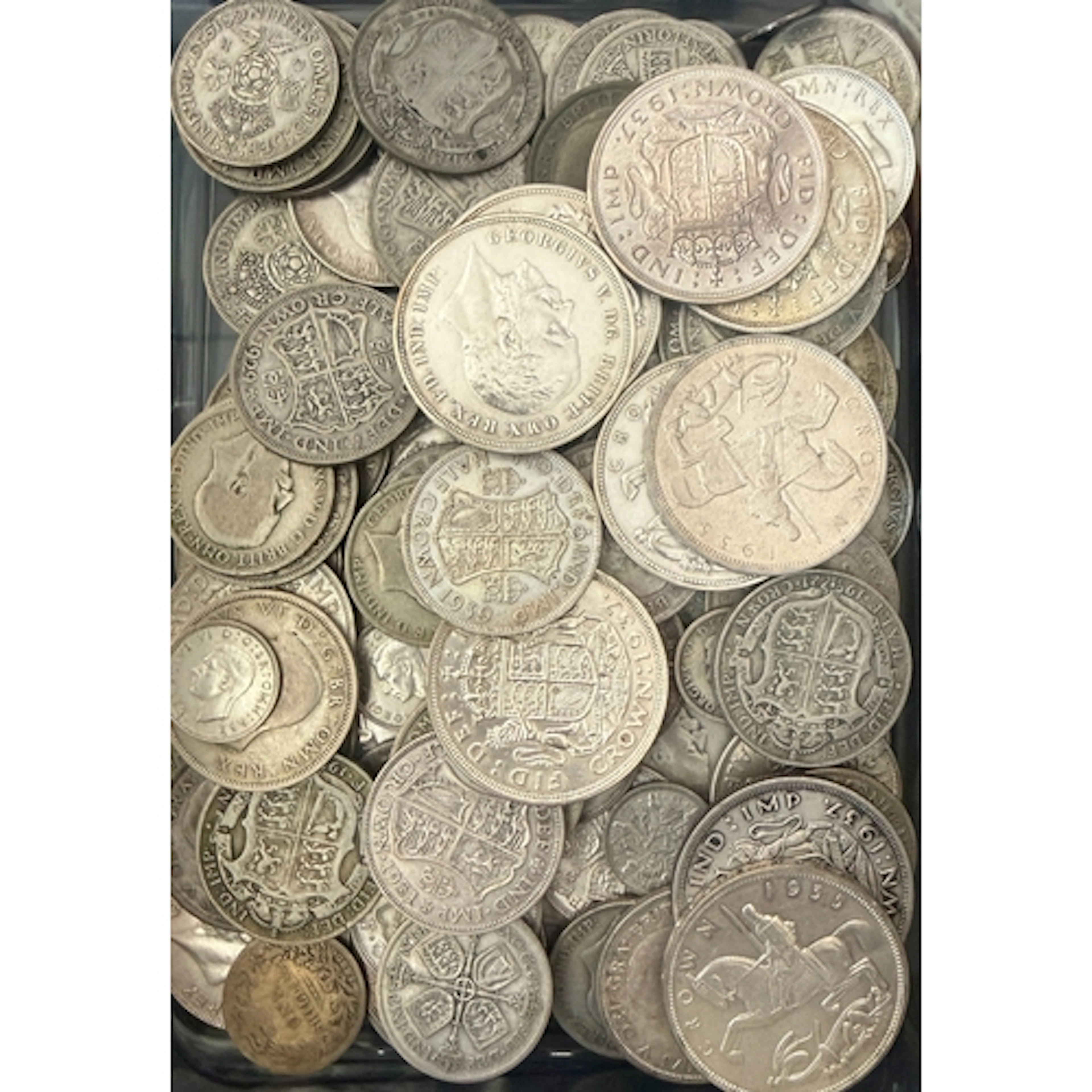 A collection of circulated UK pre-1947 silver coins, denomin...