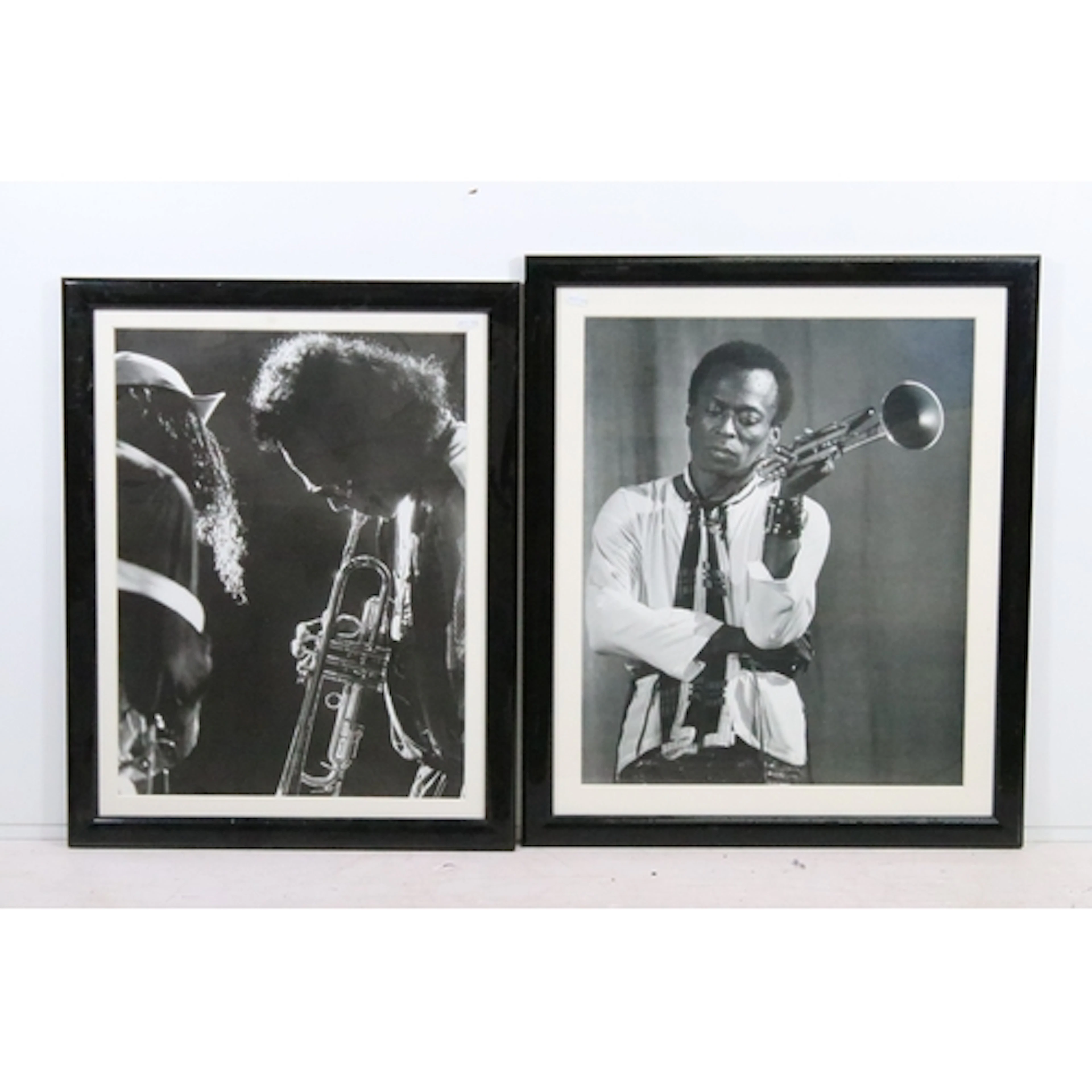 Two framed black and white prints of Miles Davis, 59cm x 48c...