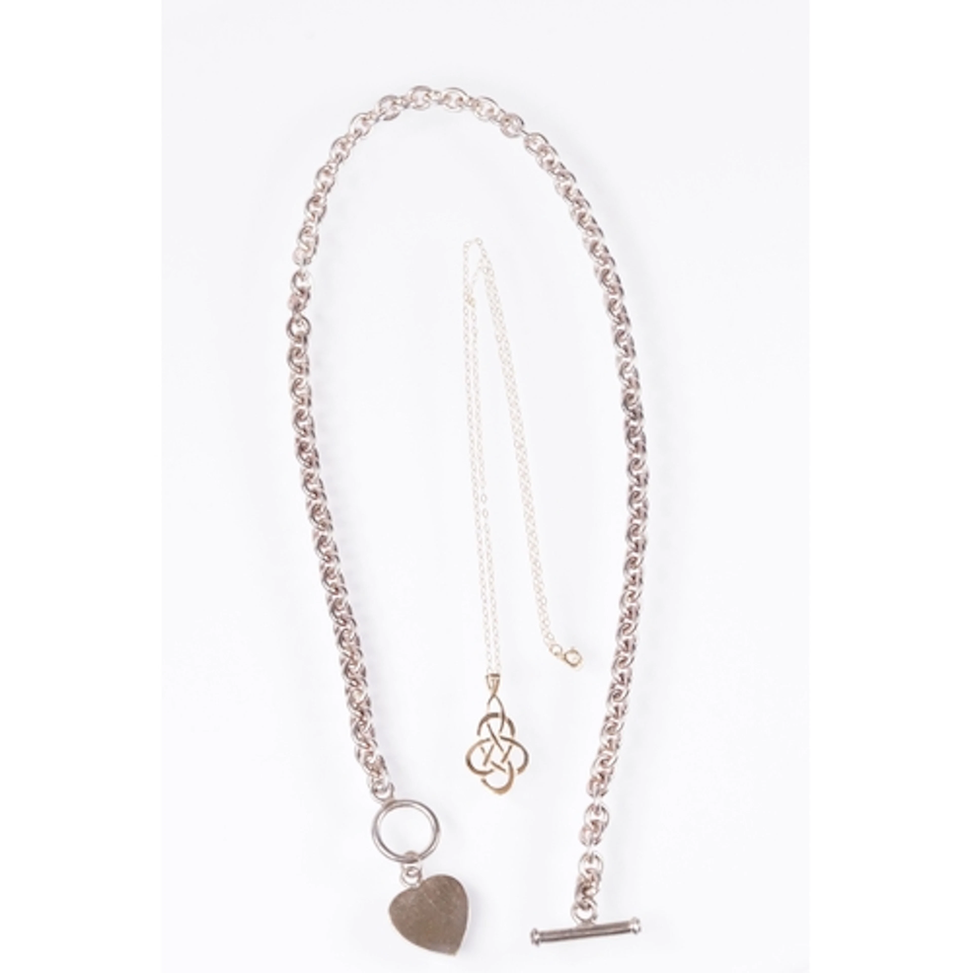 Two necklaces to include a 9ct gold fine link chain with yel...